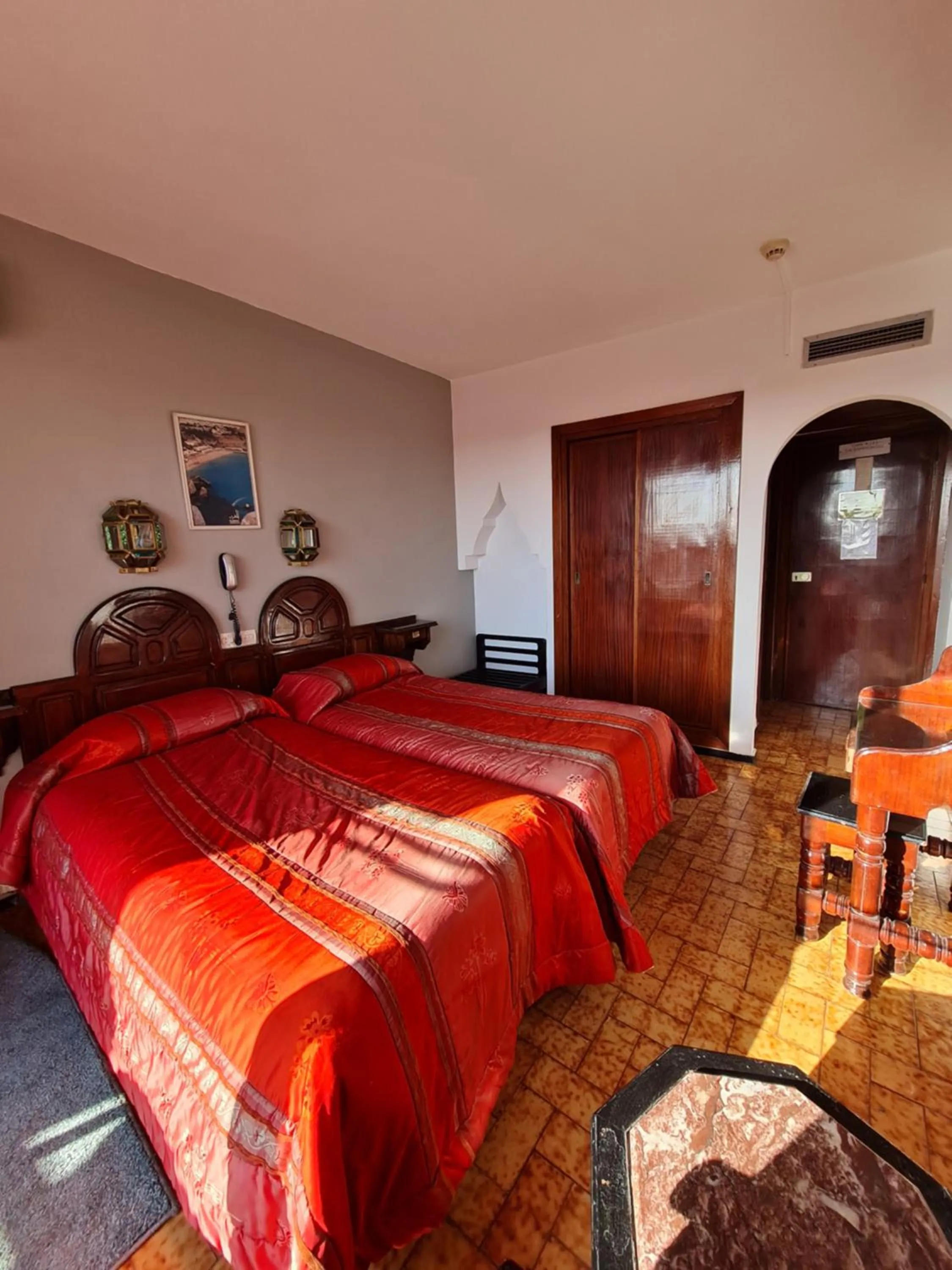 Bed in Hotel Tachfine