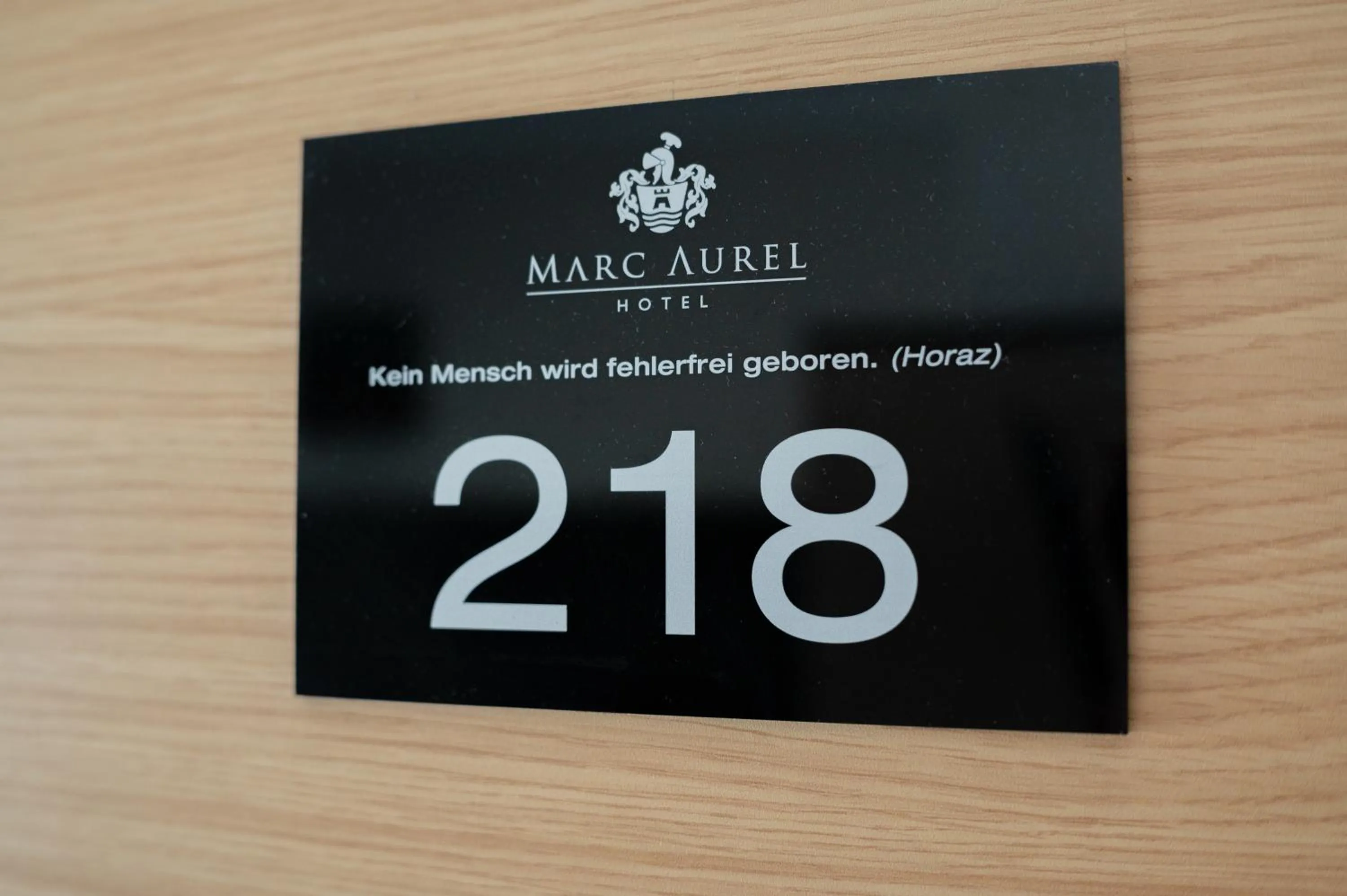 Property logo or sign in Hotel Marc Aurel