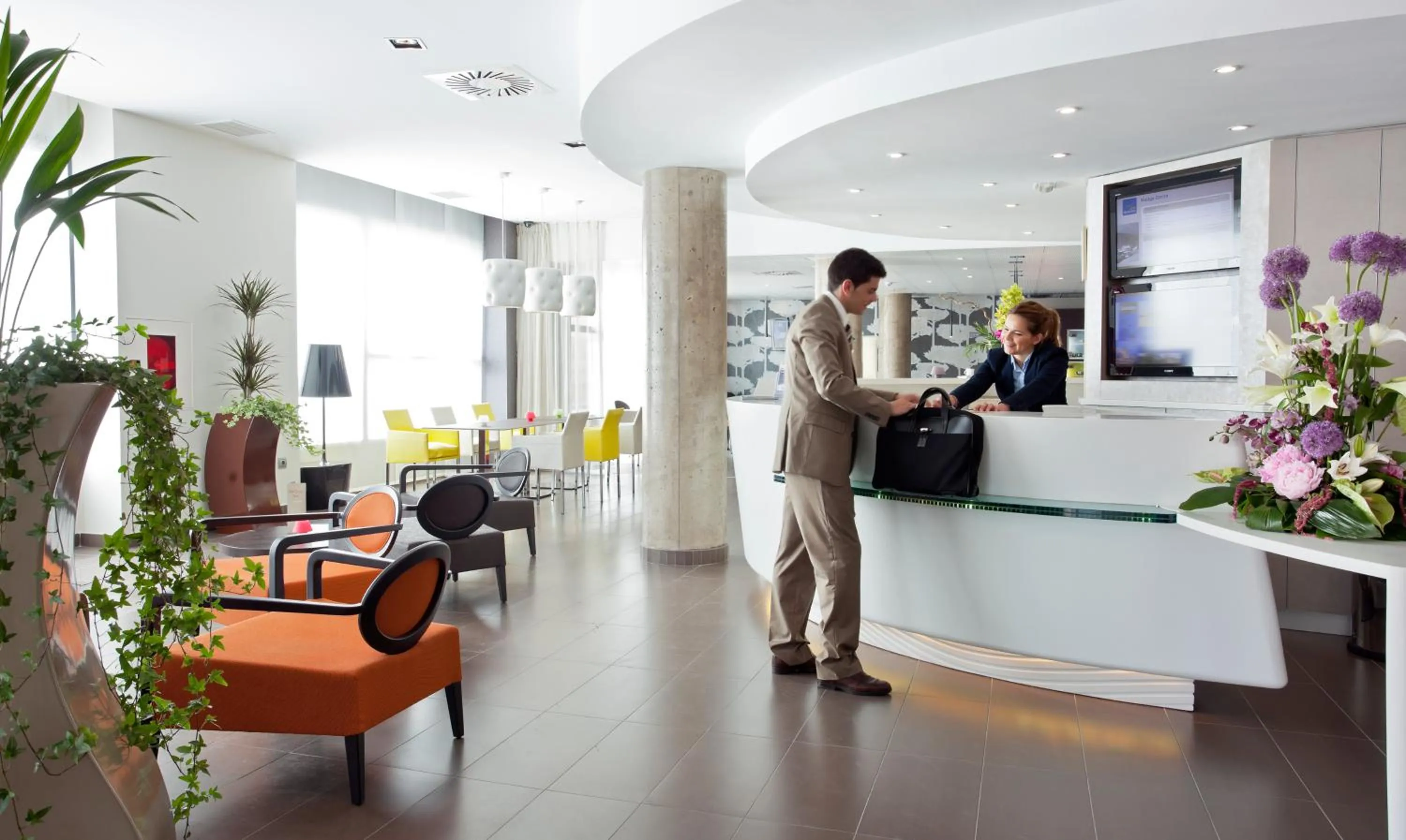 Lobby or reception in Novotel Suites Malaga Centro