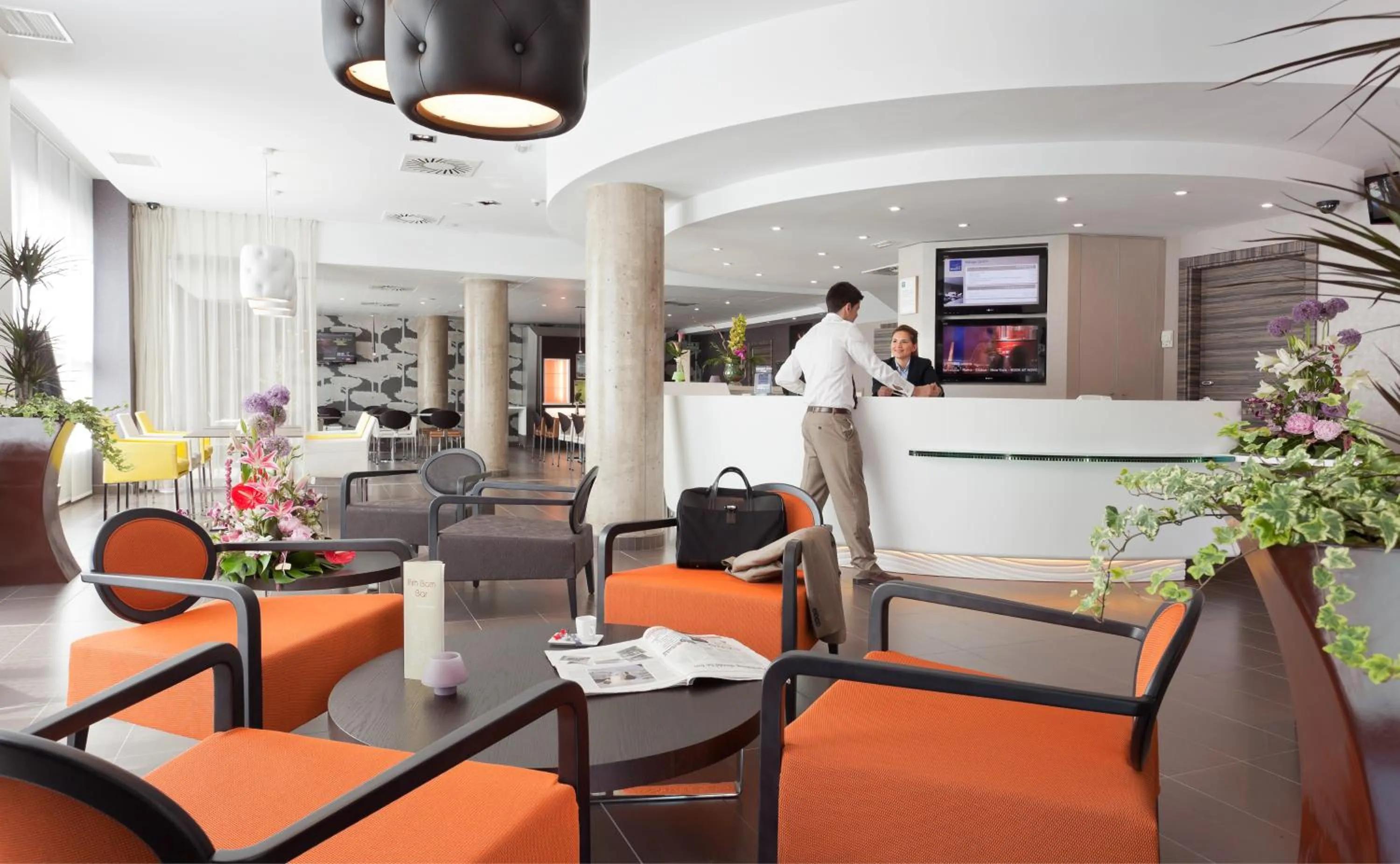 Lobby or reception in Novotel Suites Malaga Centro