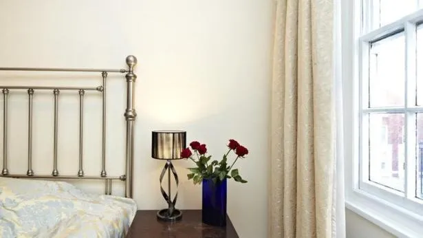 Decorative detail, Bed in Cumberland Apartments