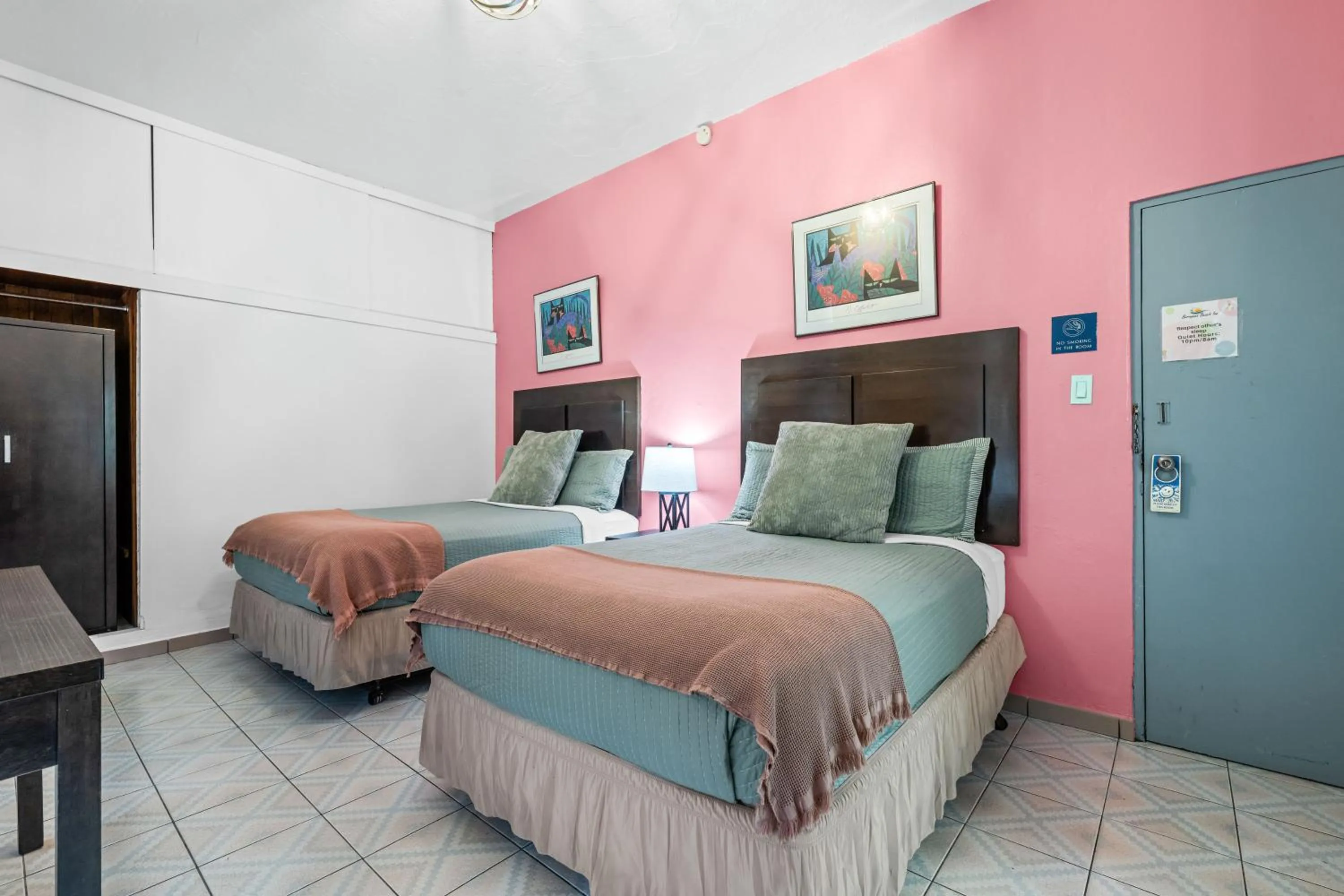 Bed in Borinquen Beach Inn