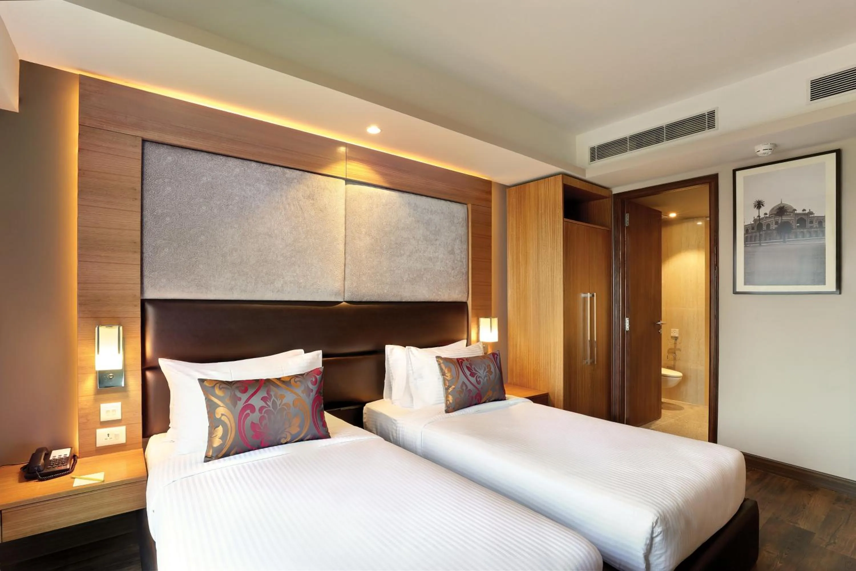 Bed in Lemon Tree Hotel, Sector 68, Sohna Road, Gurugram