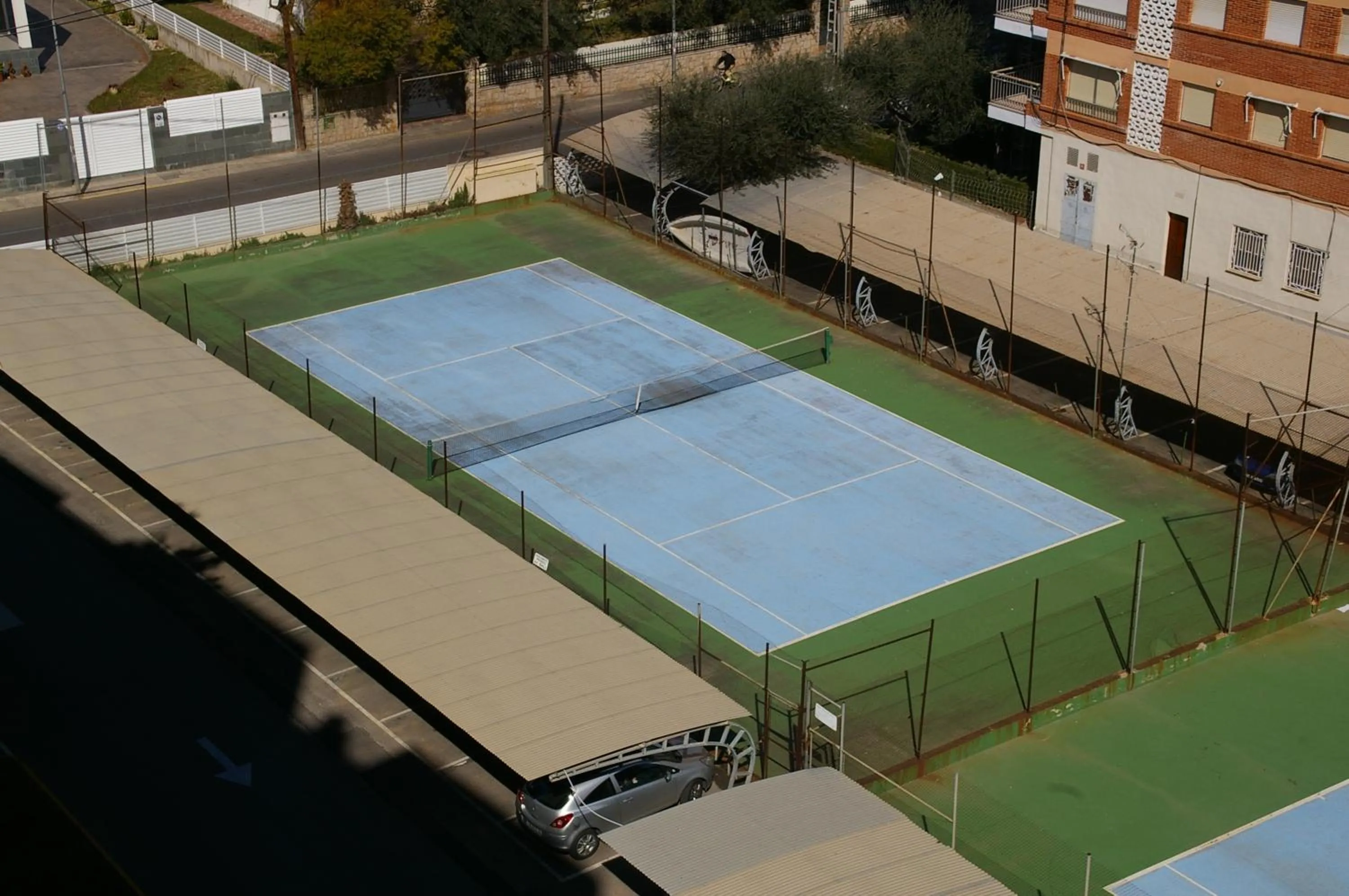 Tennis court in Bali Orangecosta