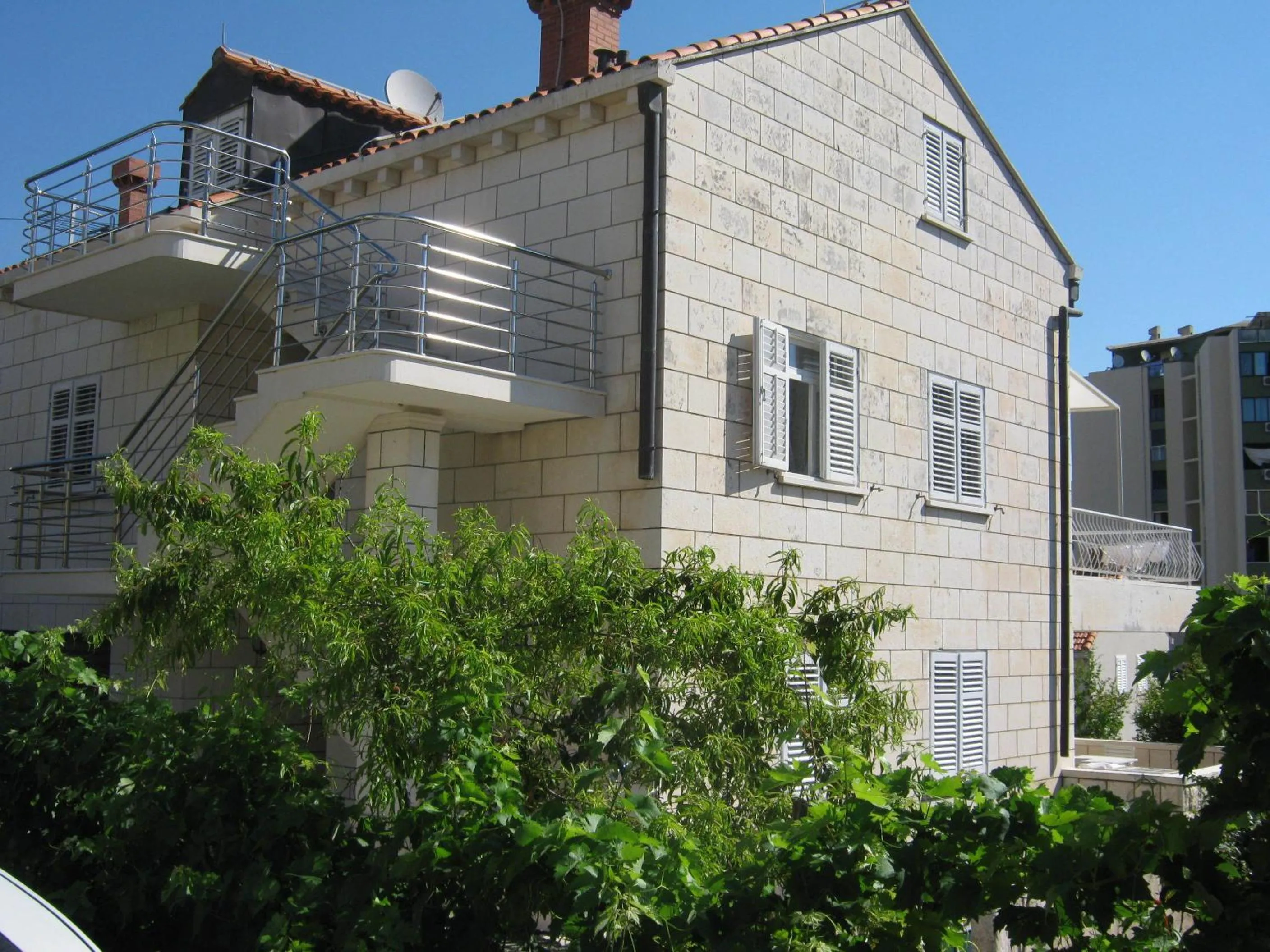 Property building in Apartments and Rooms Artemida