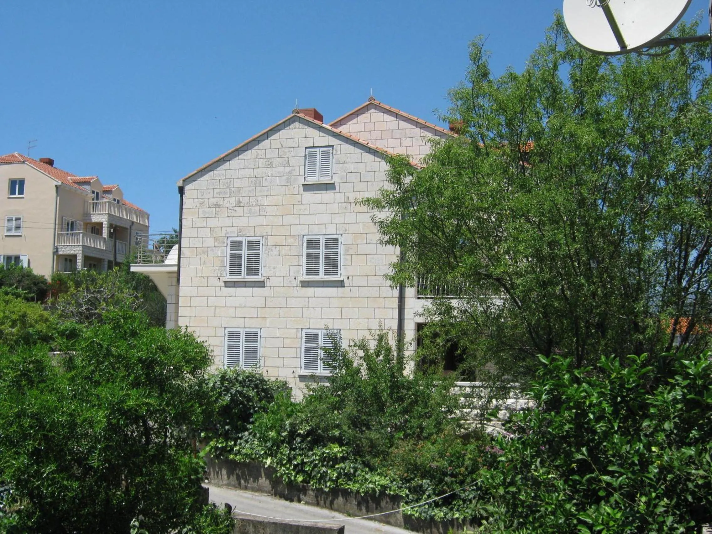 Property building in Apartments and Rooms Artemida