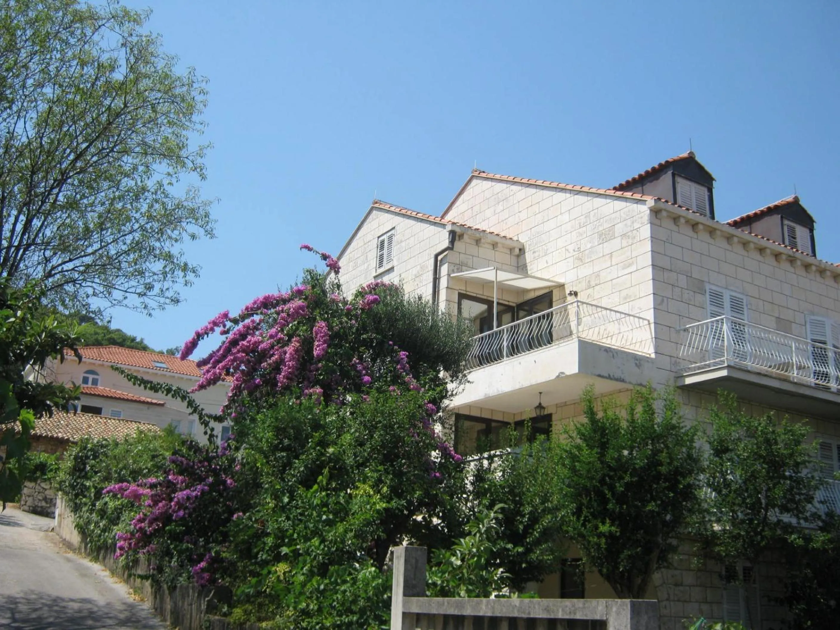 Property building in Apartments and Rooms Artemida