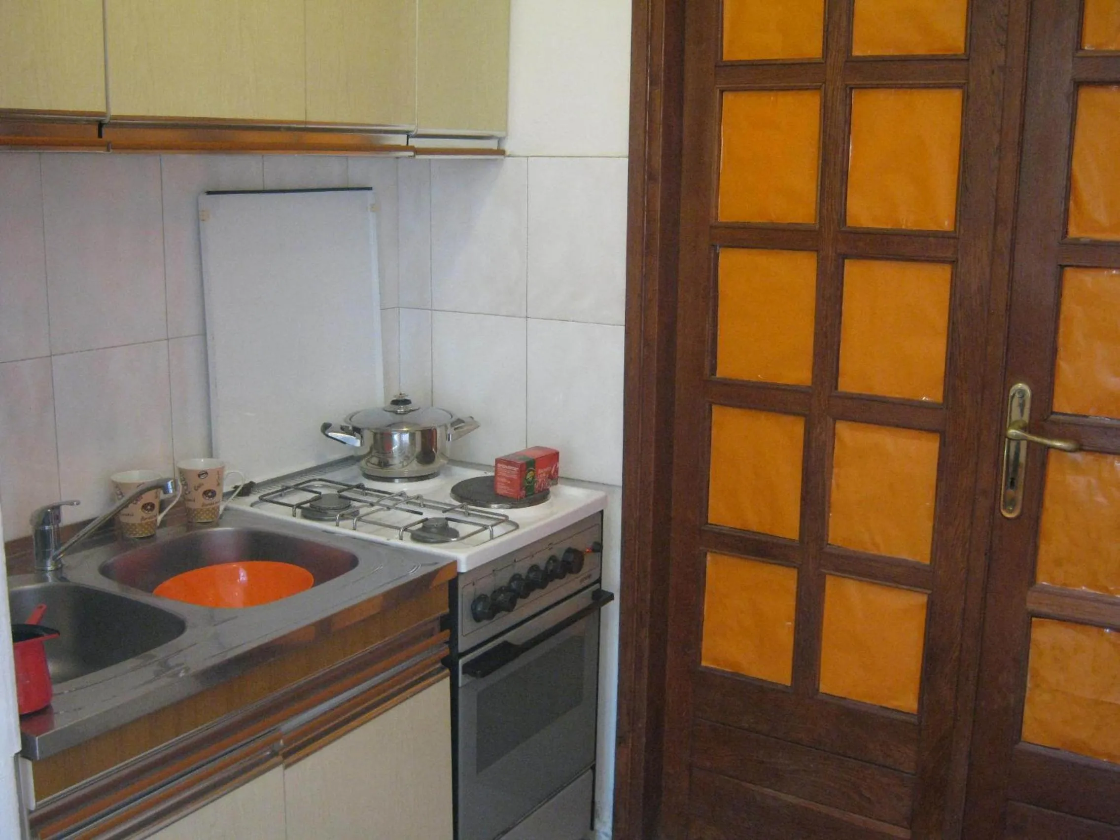 Kitchen or kitchenette in Apartments and Rooms Artemida