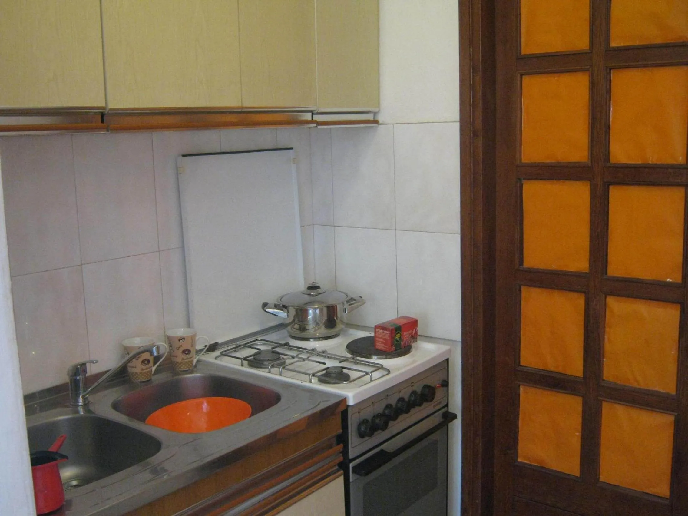 Kitchen or kitchenette in Apartments and Rooms Artemida