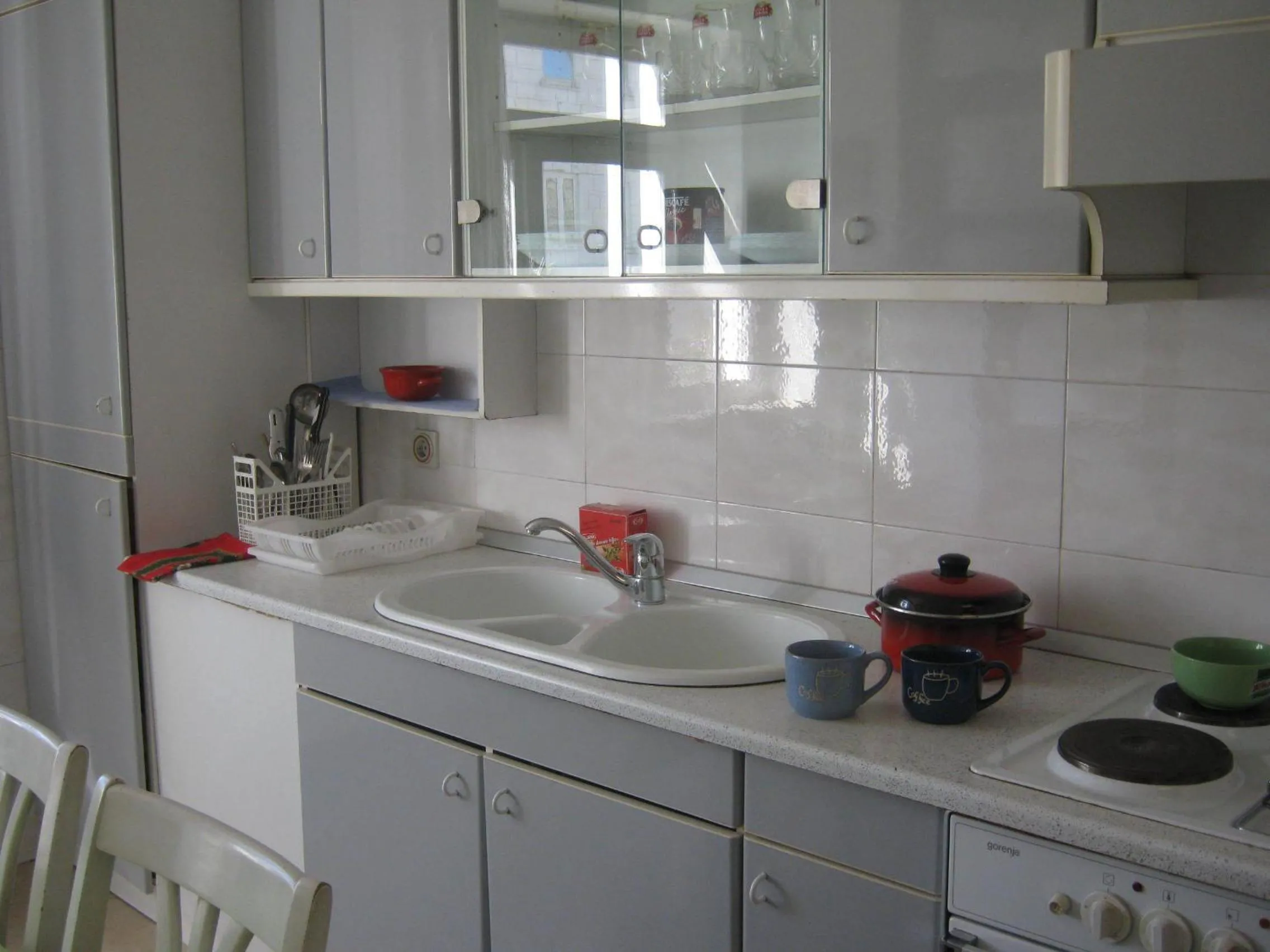 Kitchen or kitchenette in Apartments and Rooms Artemida