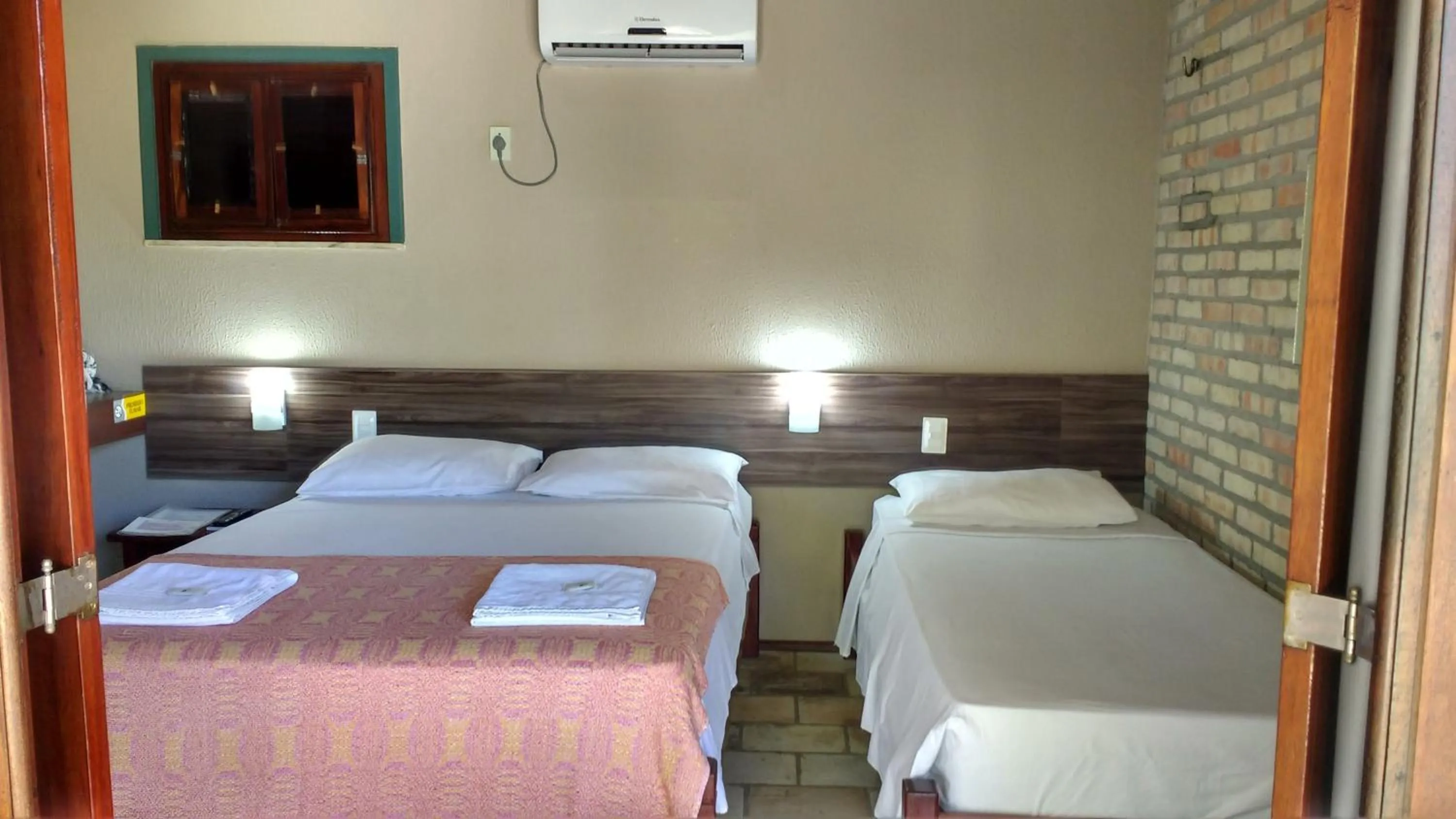 Bed in Pousada 7 Mares