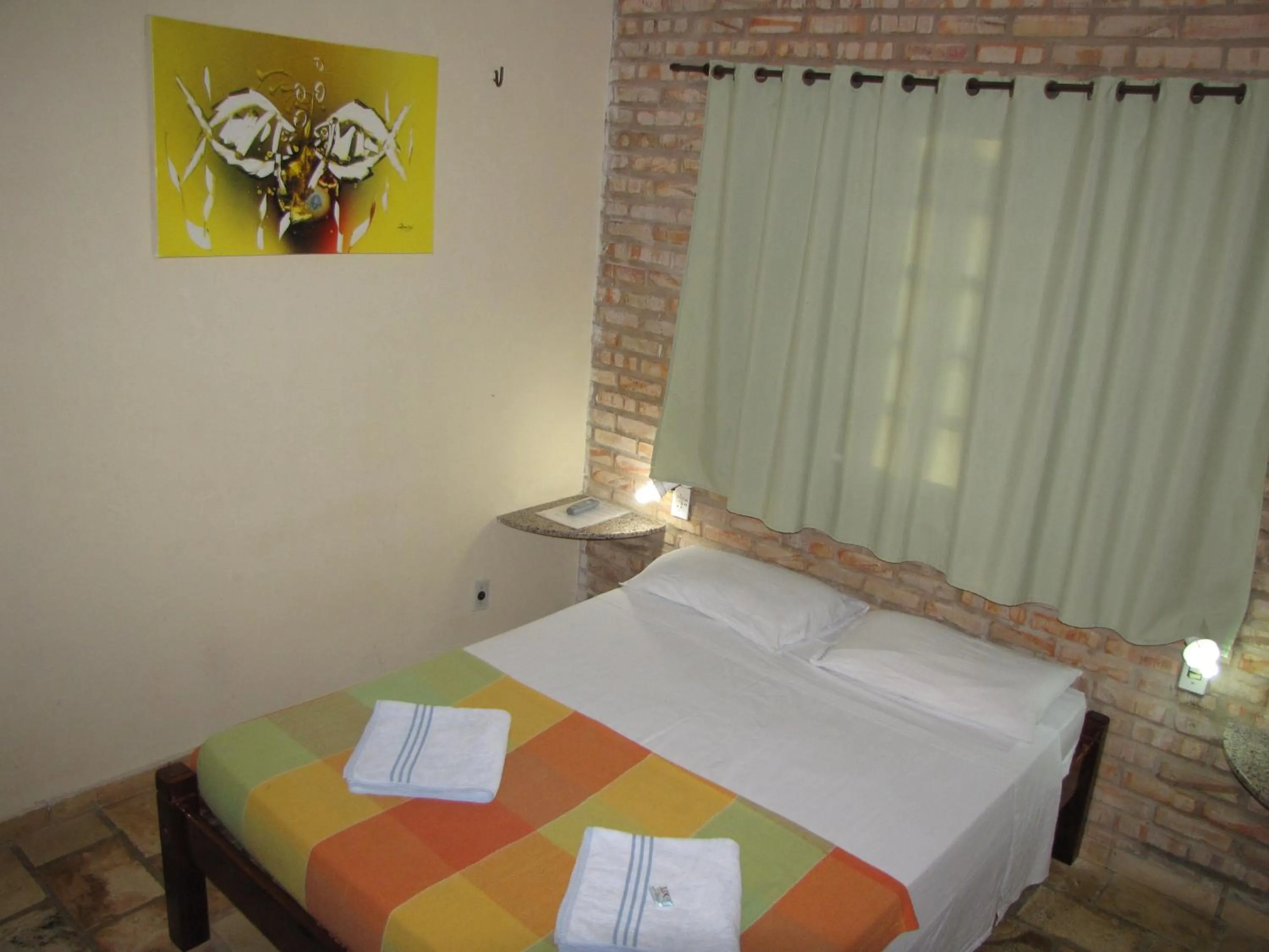 Bed in Pousada 7 Mares