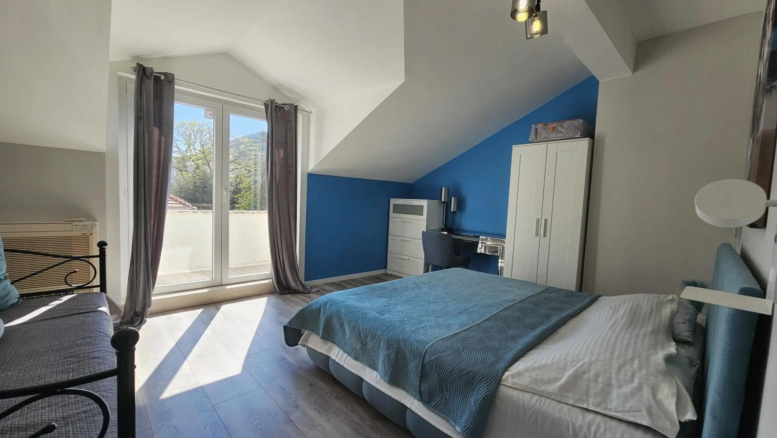 Bed in Adria Apartments and Rooms