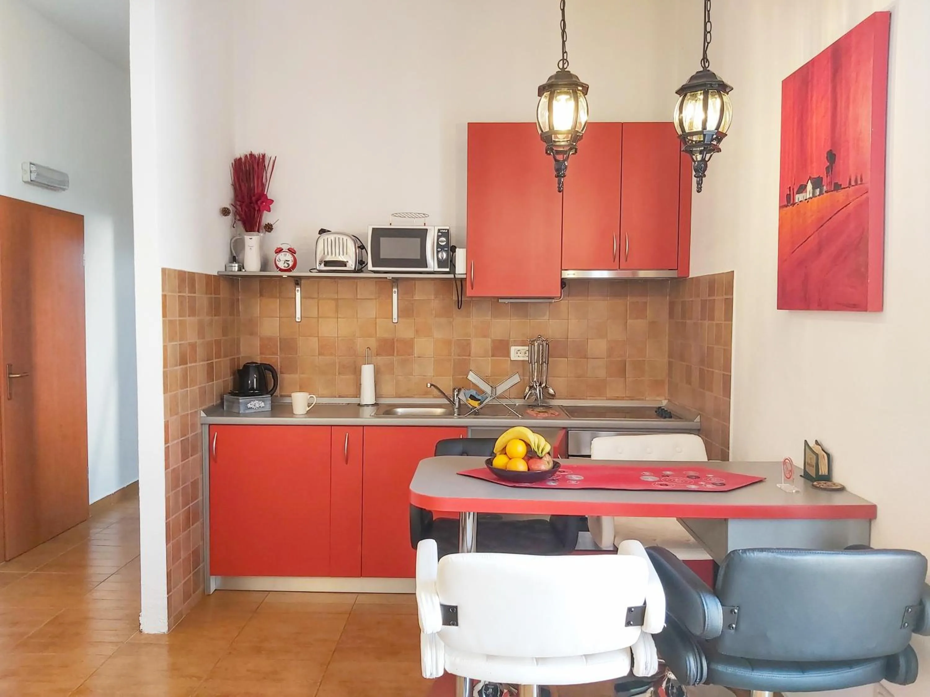 Kitchen or kitchenette in Adria Apartments and Rooms