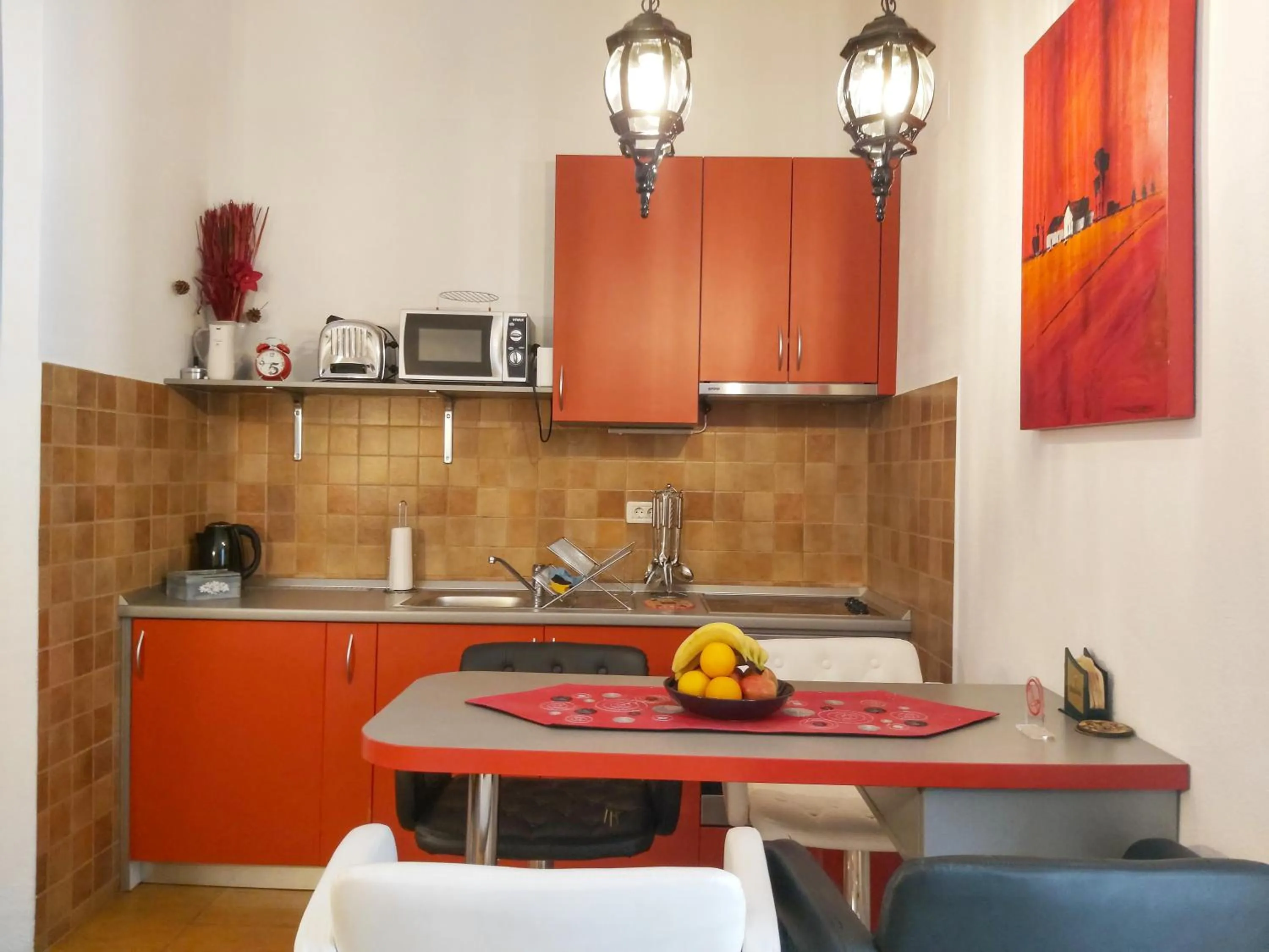 Kitchen or kitchenette in Adria Apartments and Rooms