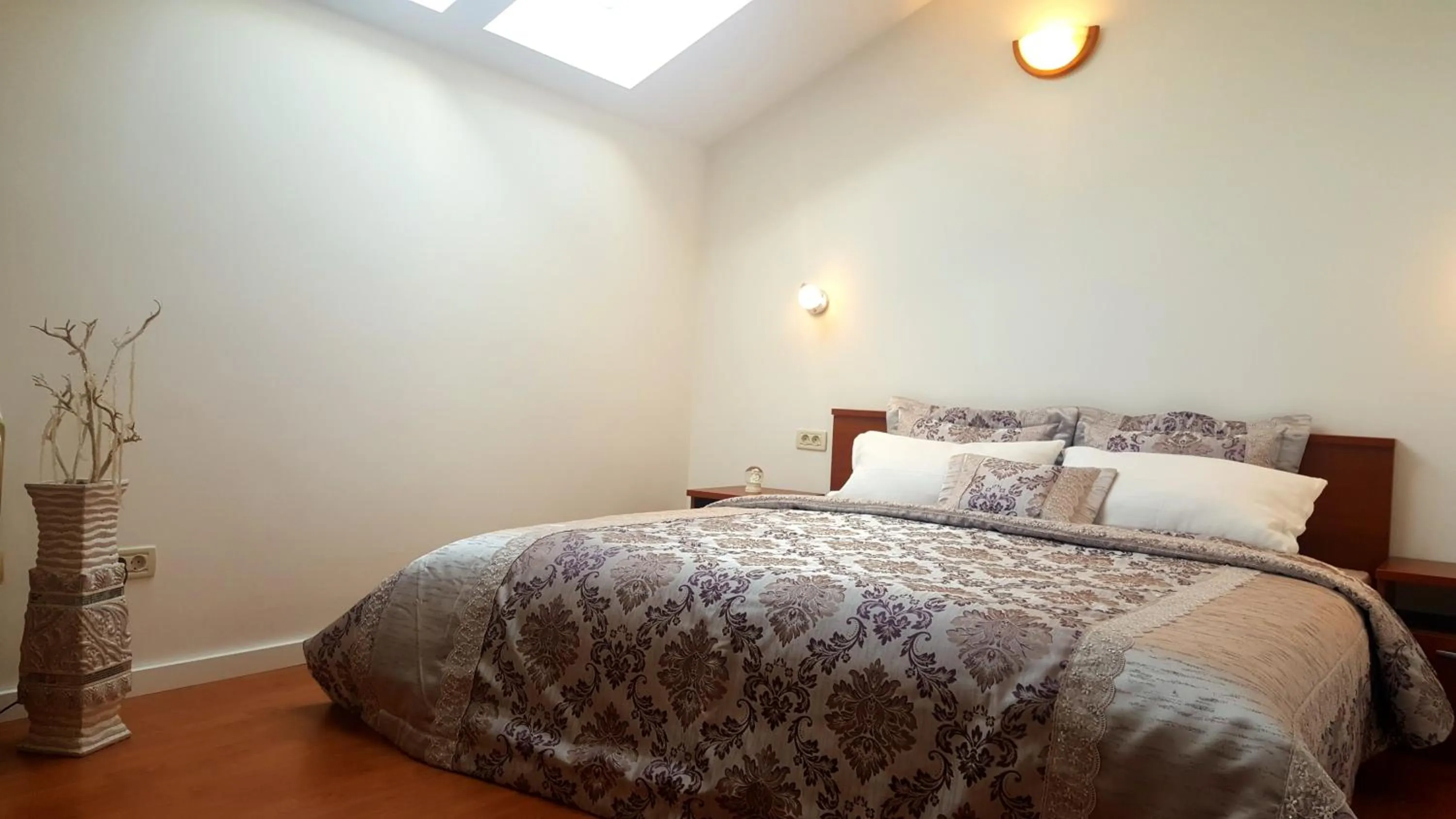 Bed in Adria Apartments and Rooms