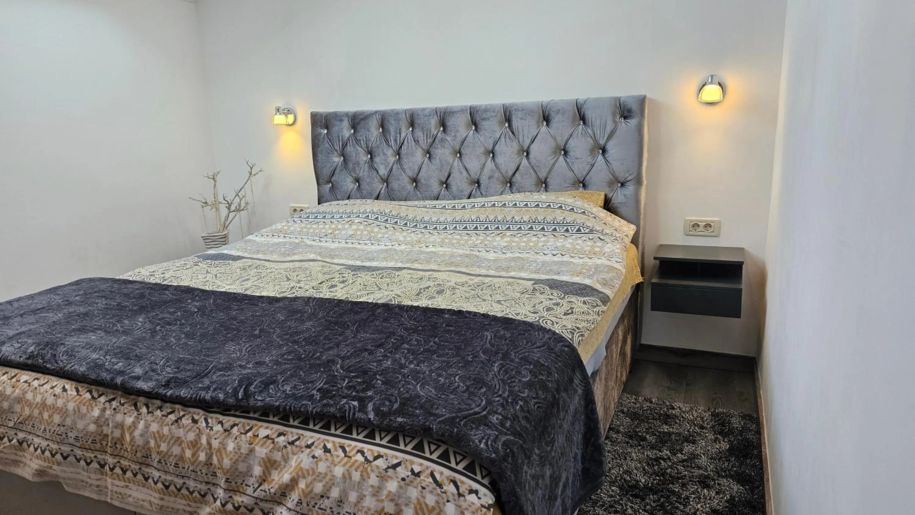 Bed in Adria Apartments and Rooms