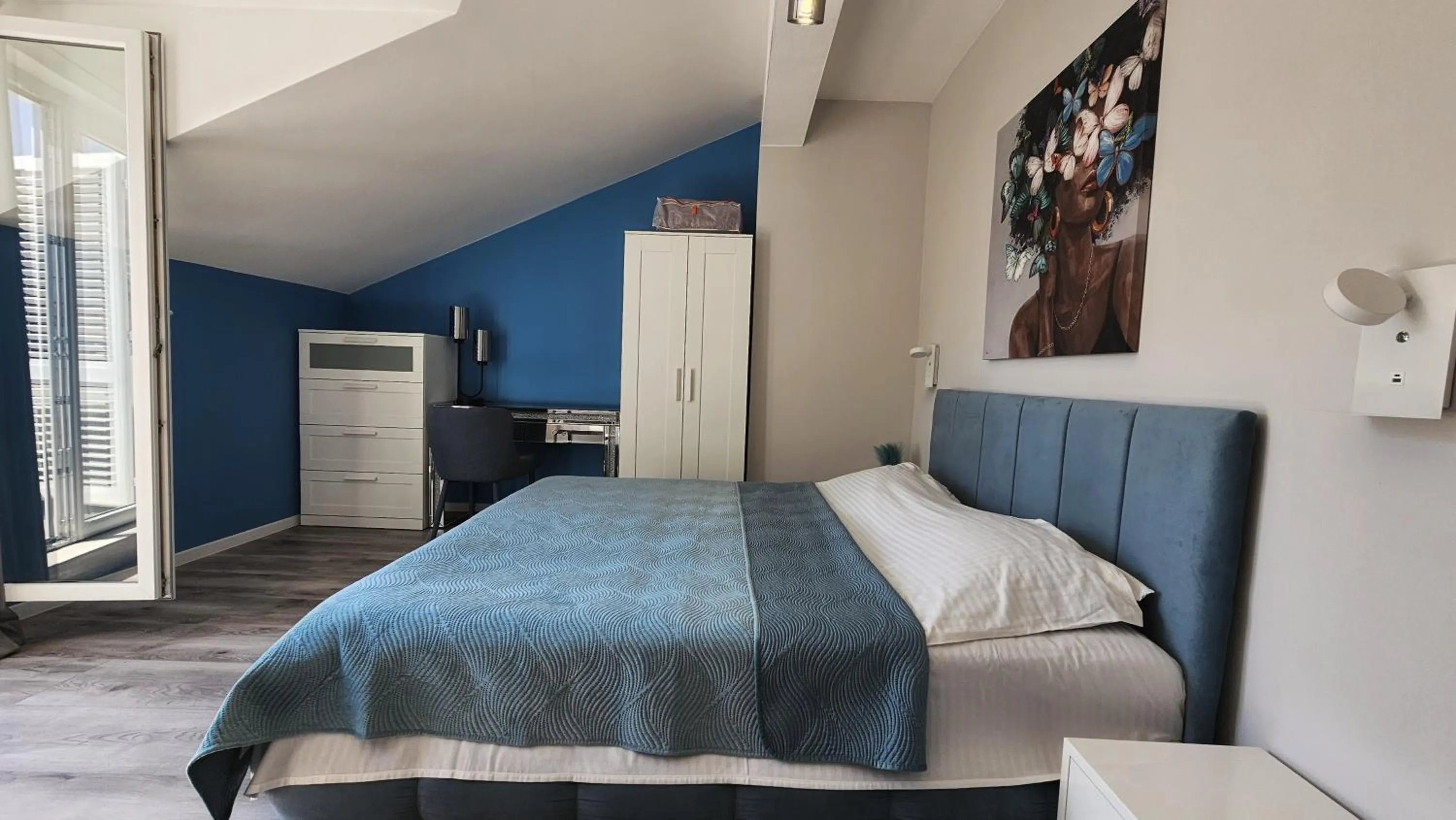 Bed in Adria Apartments and Rooms