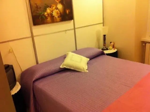 Bed in La Castellana Loft Hotel