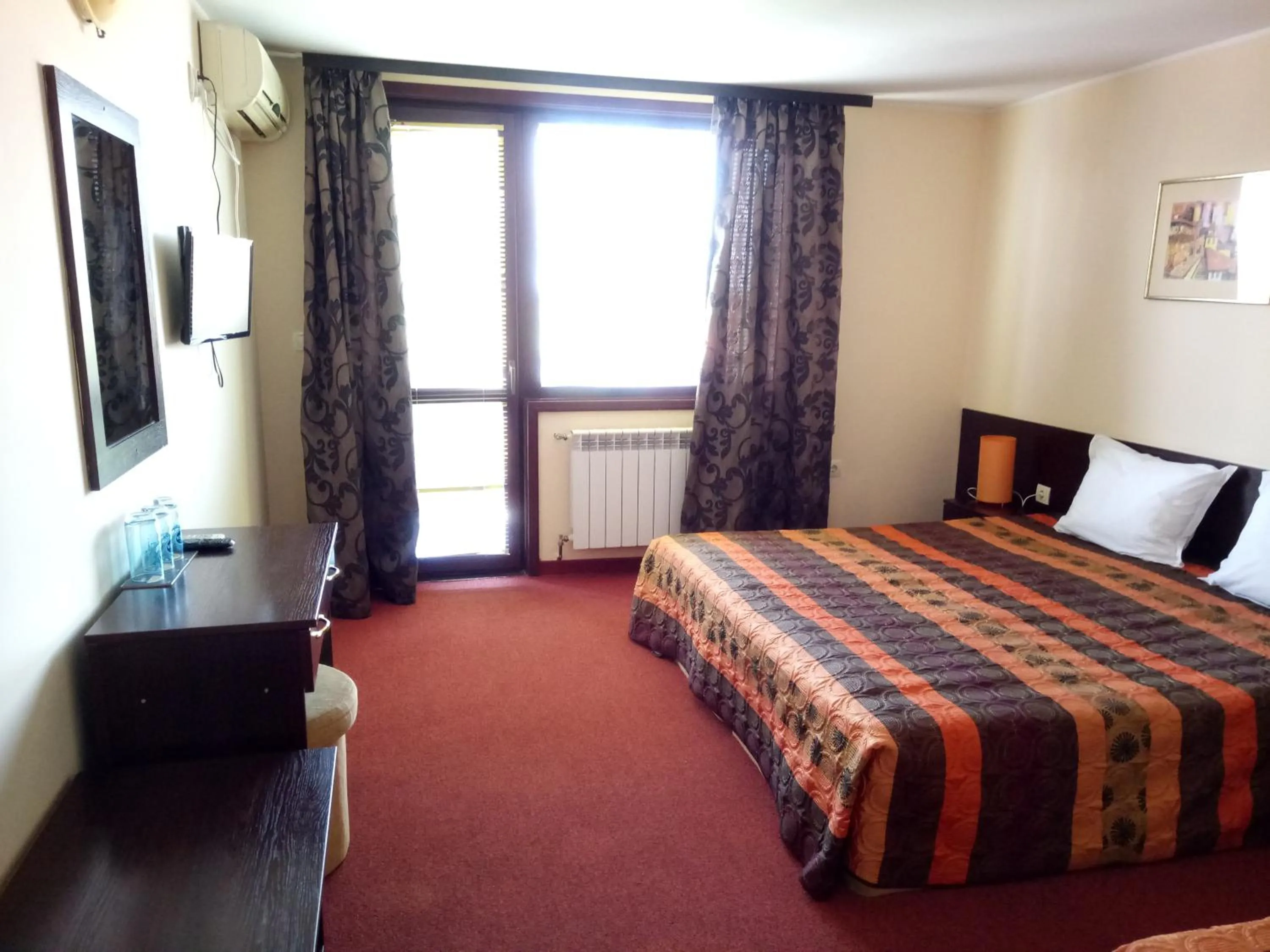 Bed in Family hotel Elena