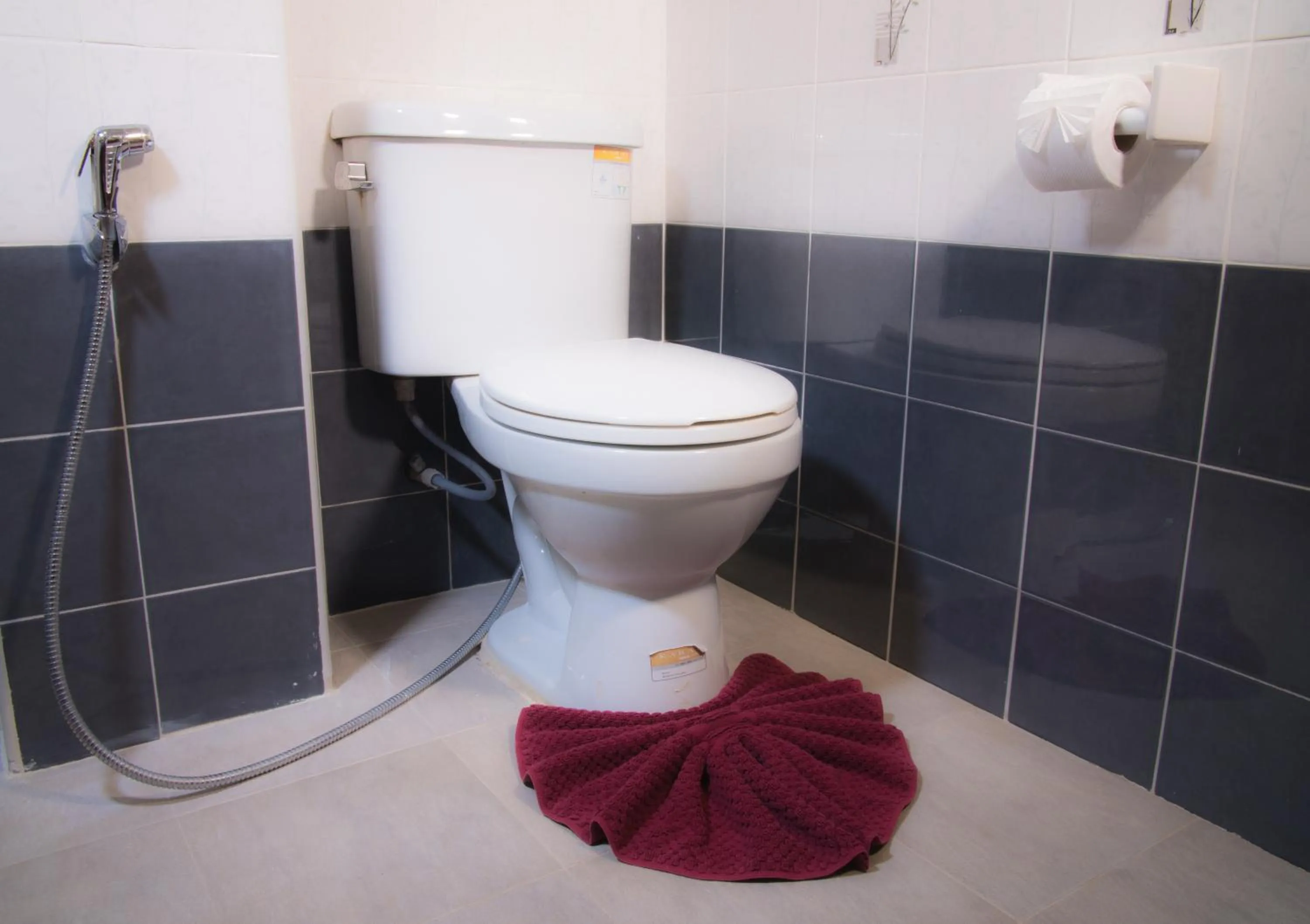 Toilet in White Flower Lanta