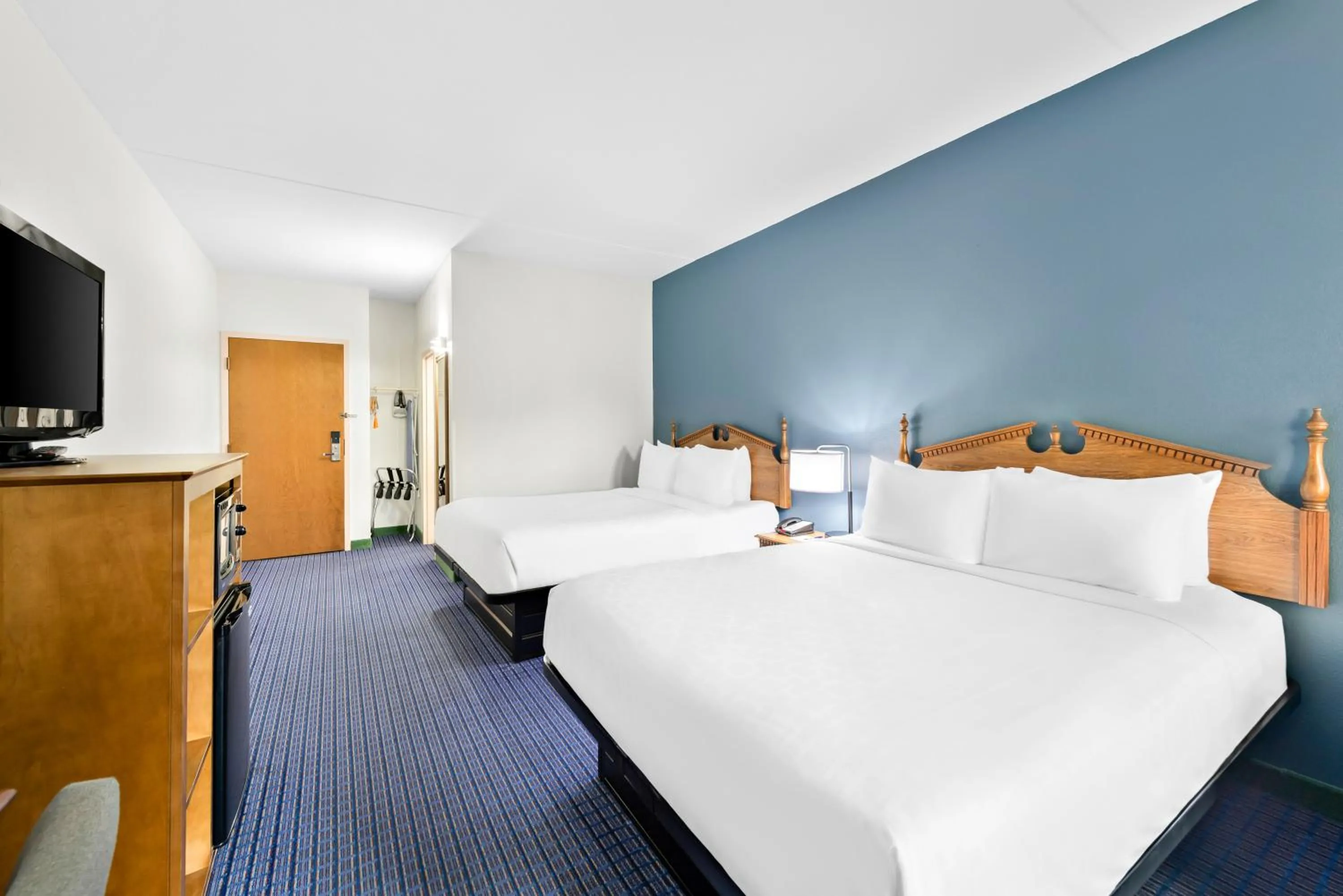 Bed in Clarion Inn Branson