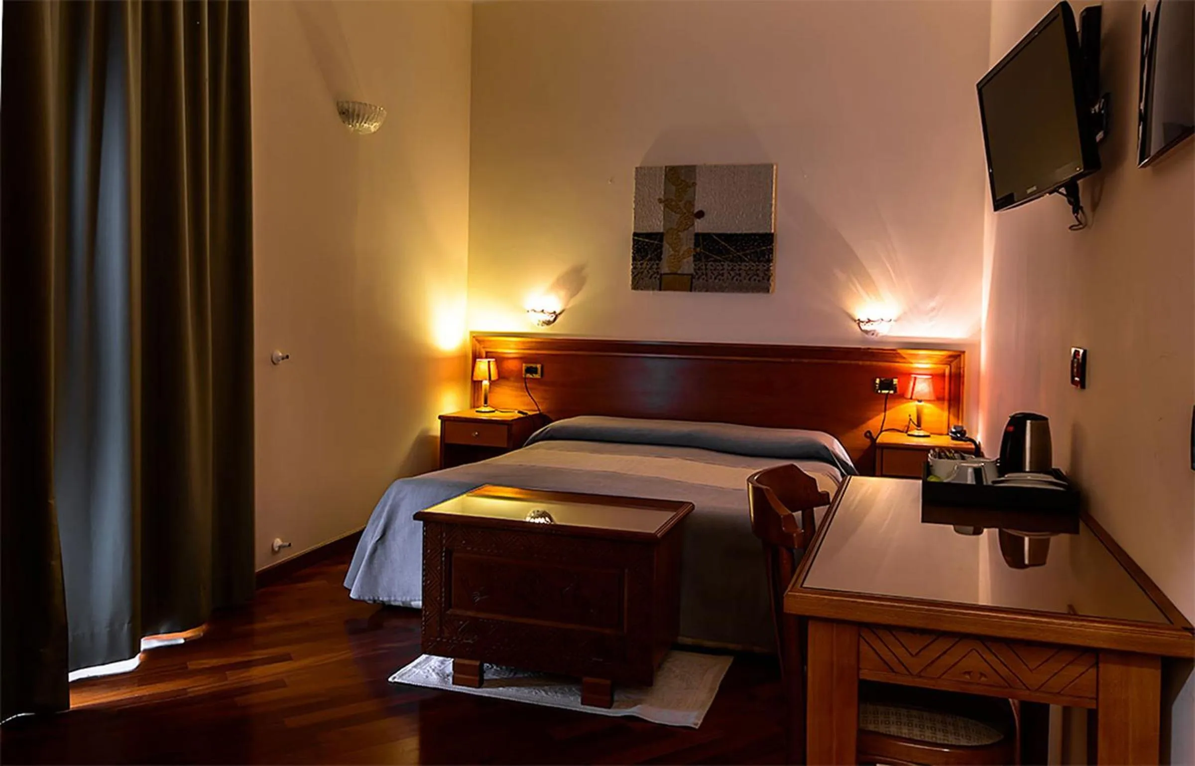 Photo of the whole room in Hotel Del Corso