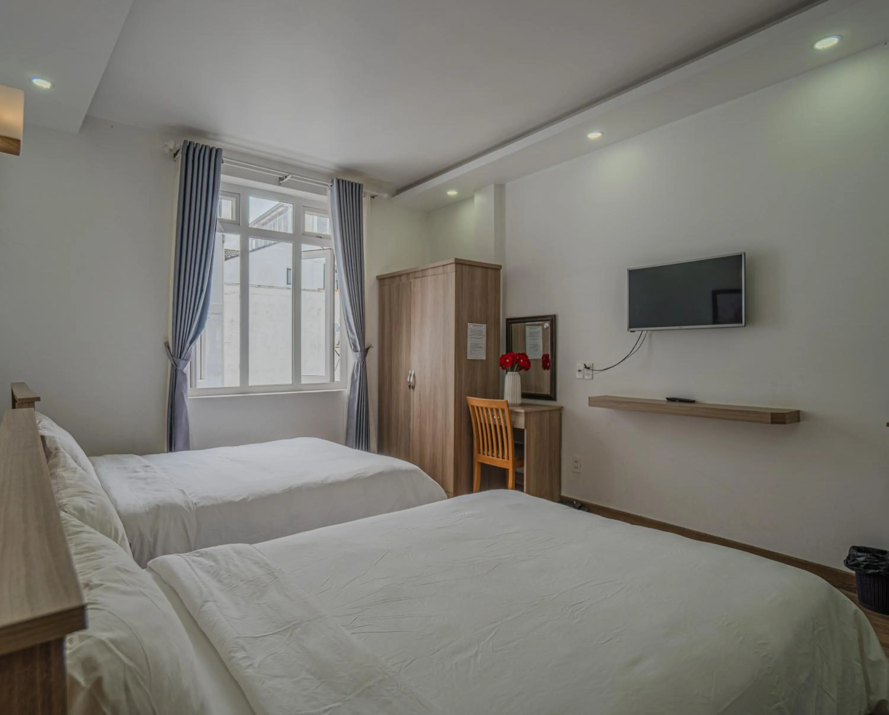Bed in Belle Amour Hotel