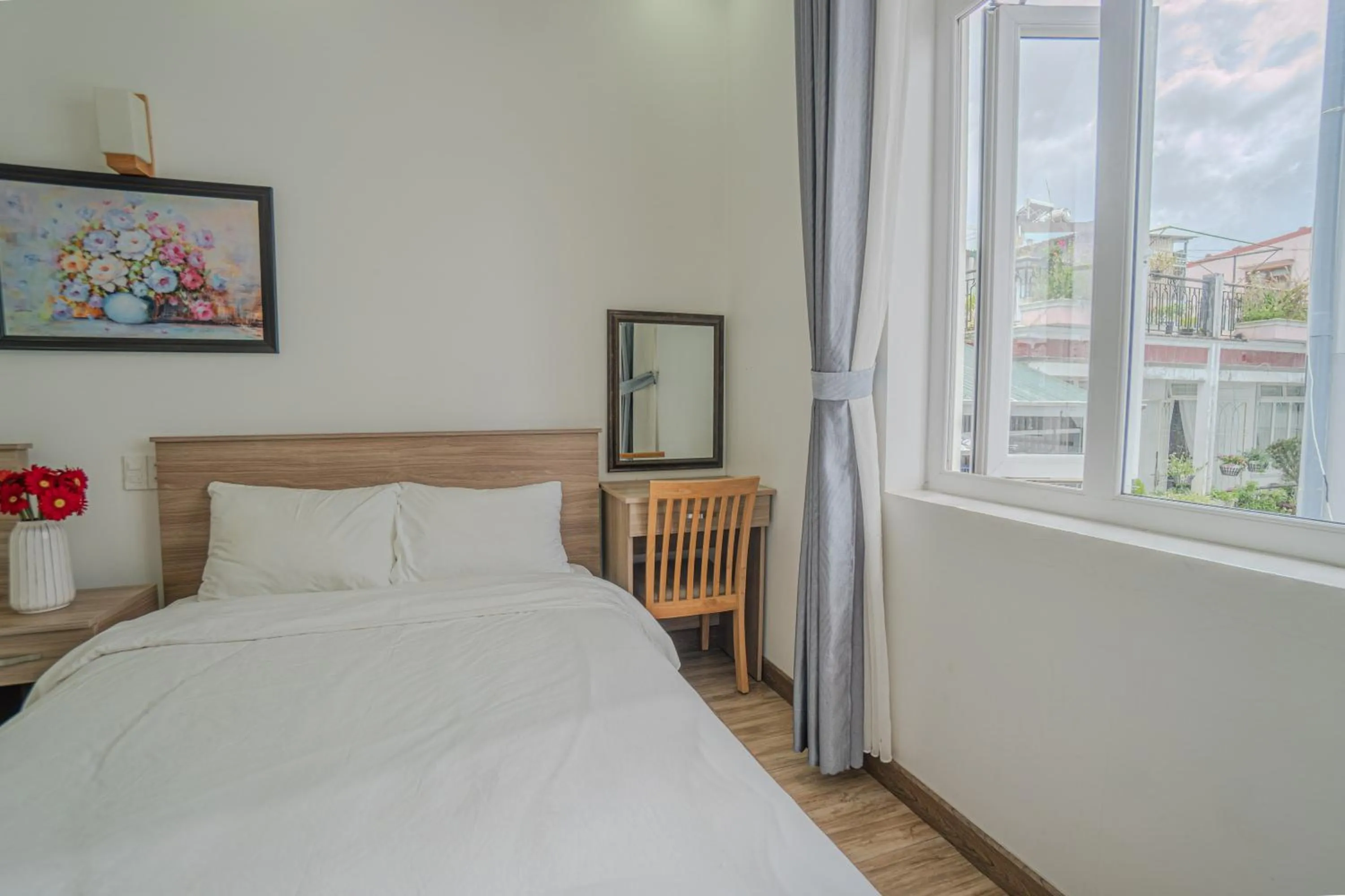 Bed in Belle Amour Hotel