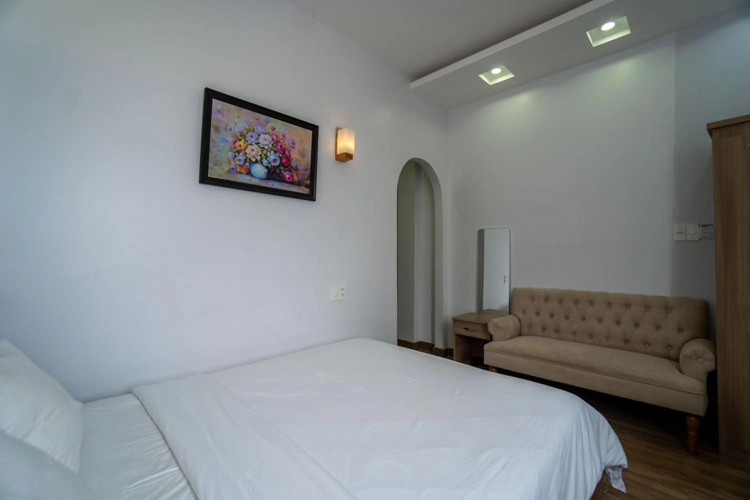 Bed in Belle Amour Hotel