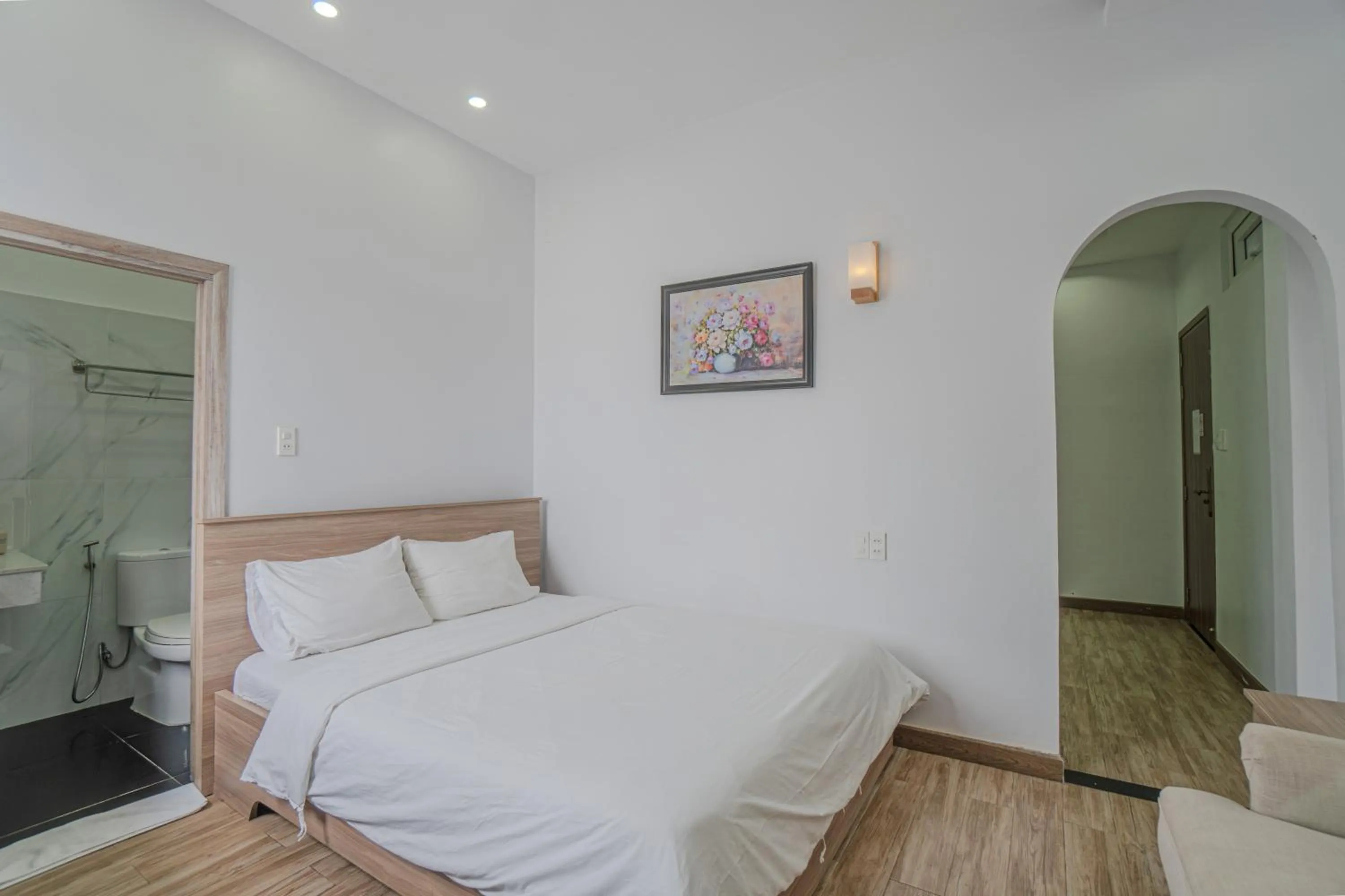 Bed in Belle Amour Hotel
