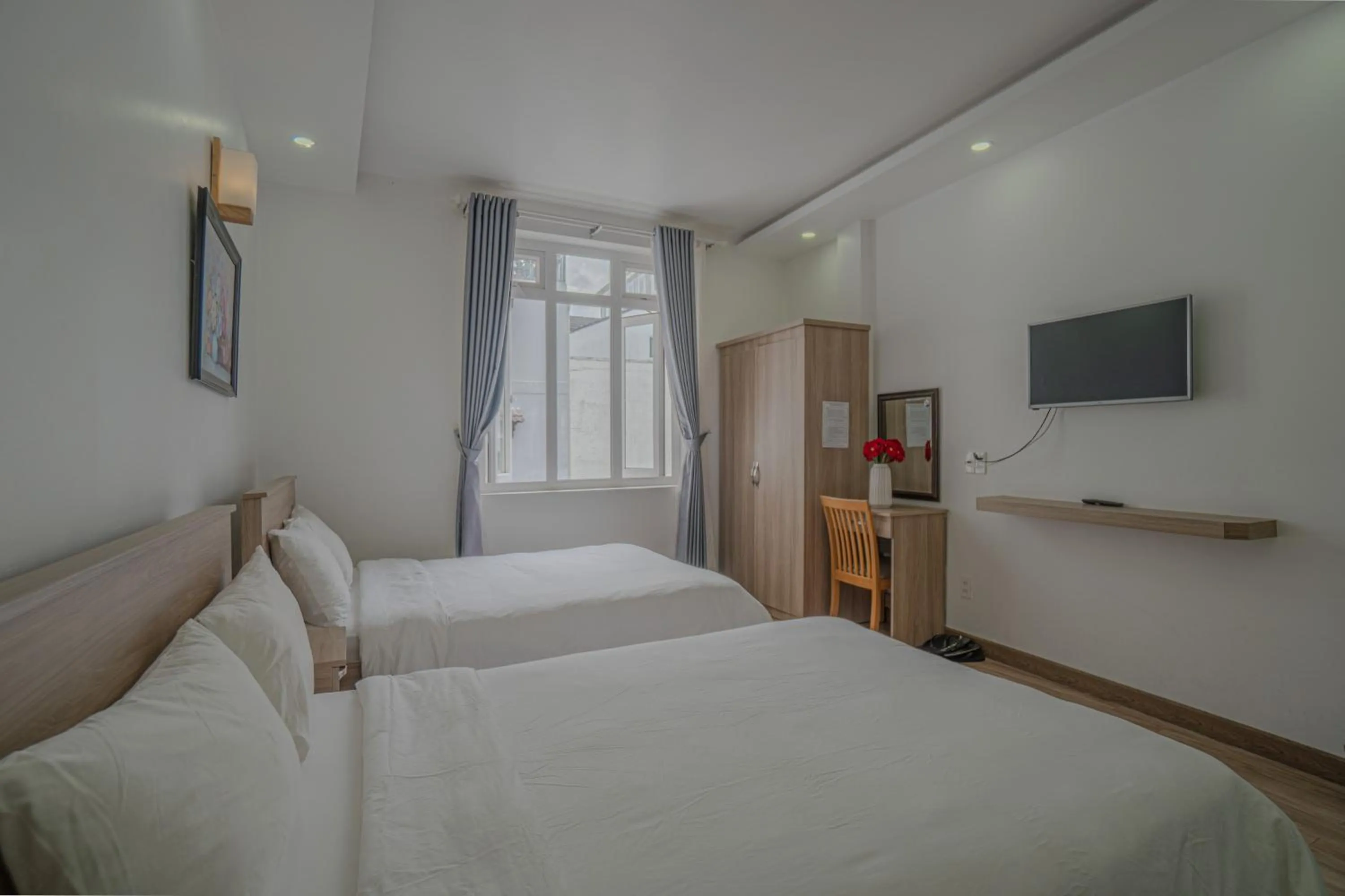 Bed in Belle Amour Hotel