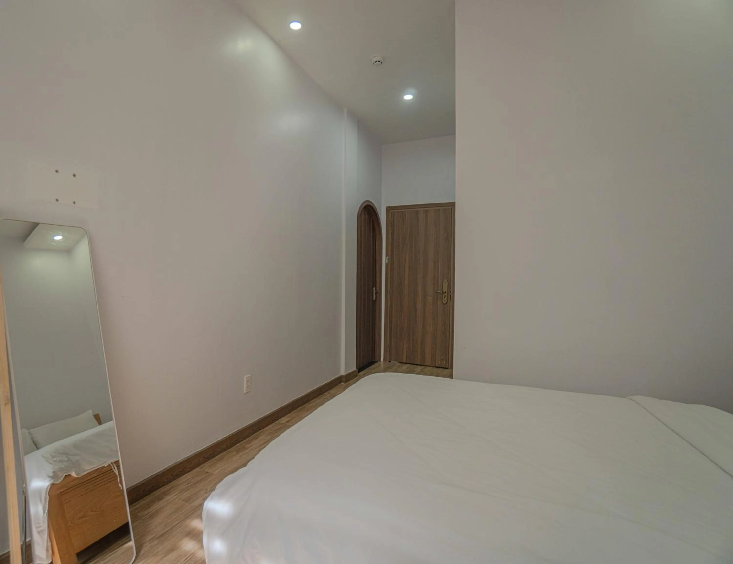 Bed in Belle Amour Hotel