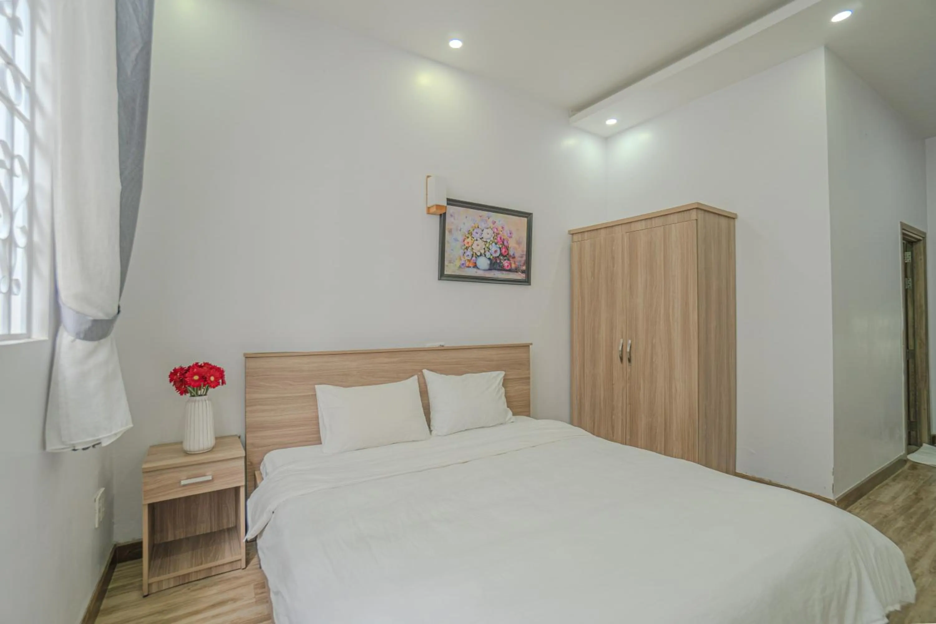 Bed in Belle Amour Hotel