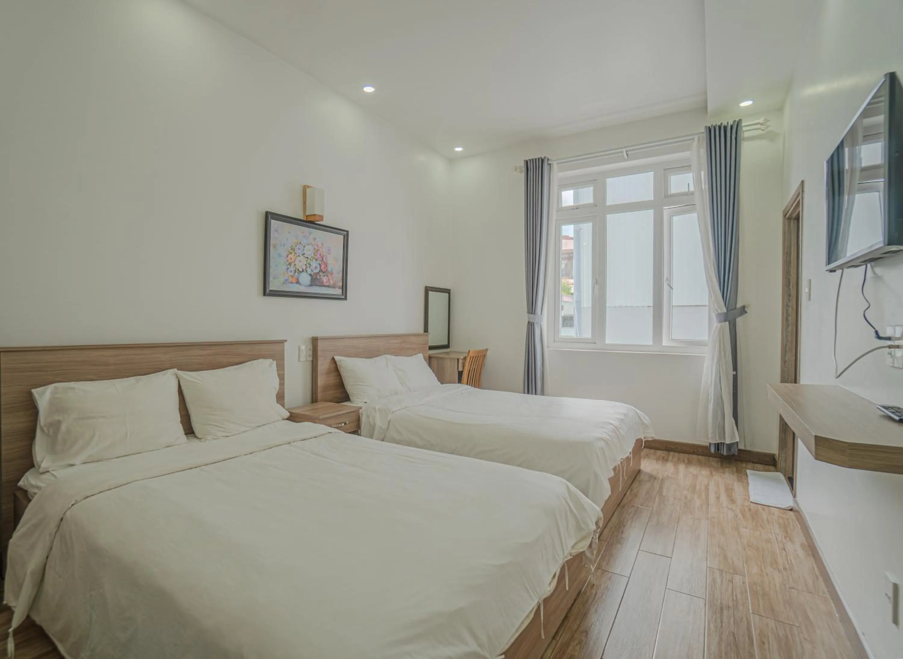 Bed in Belle Amour Hotel