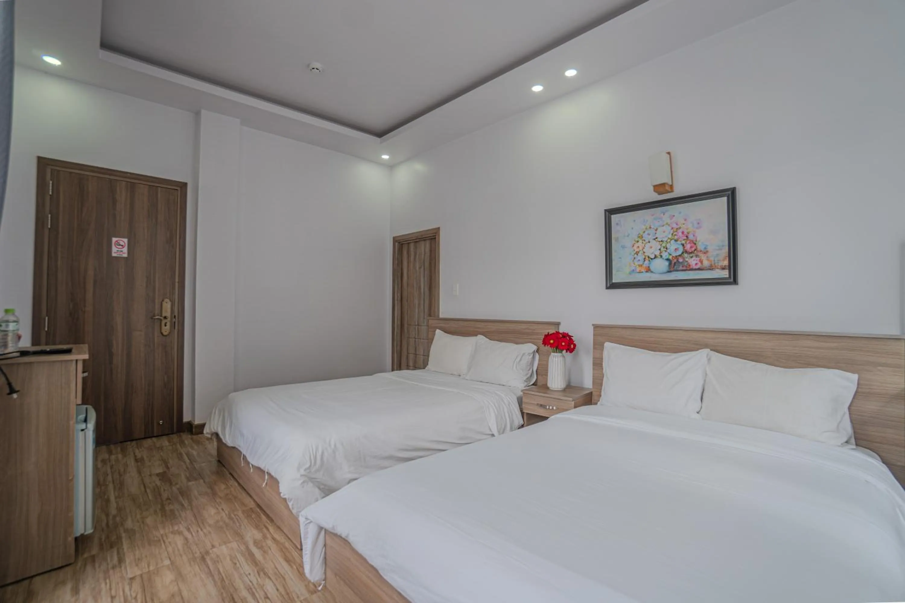 Bed in Belle Amour Hotel