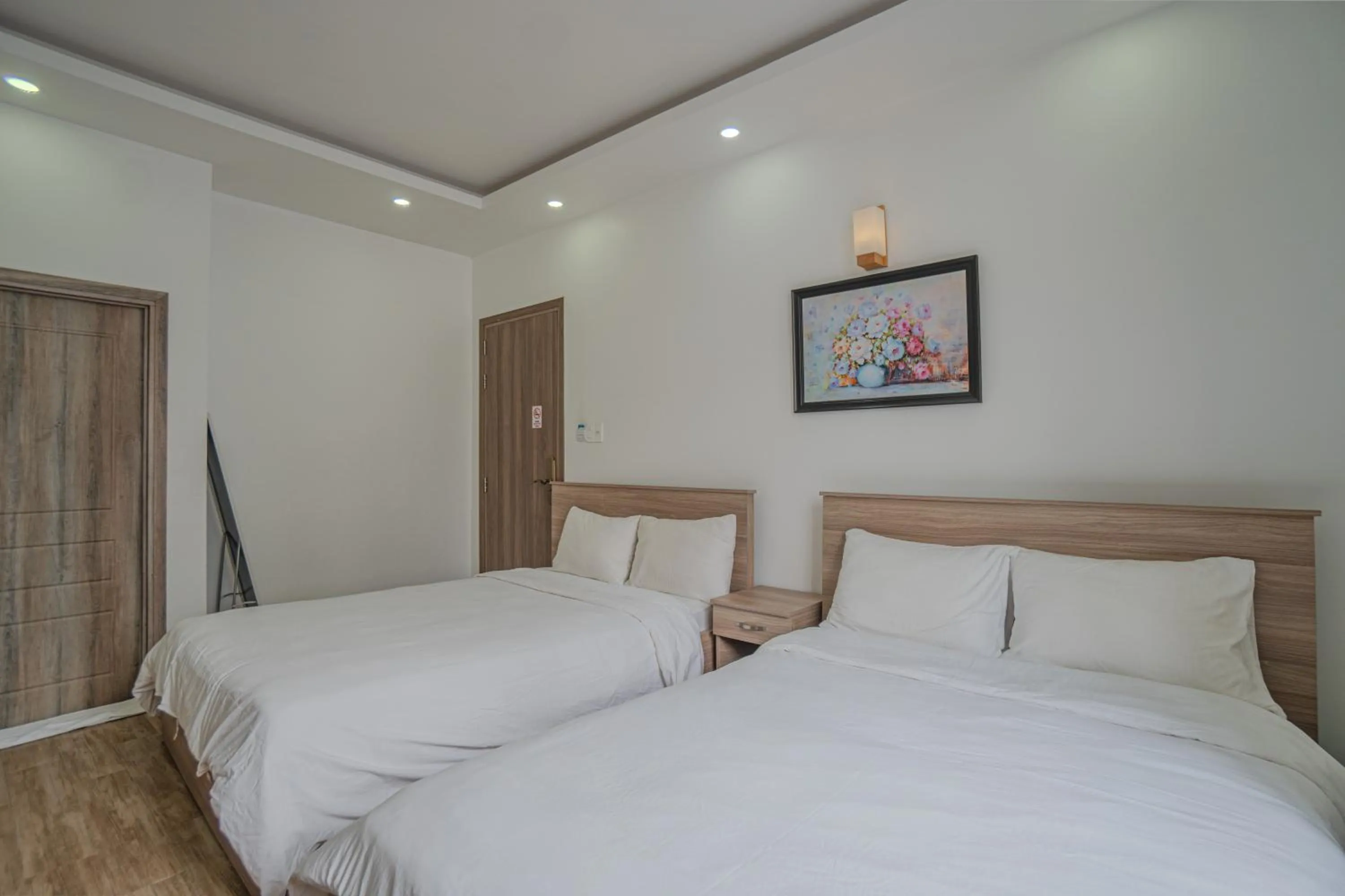Bed in Belle Amour Hotel