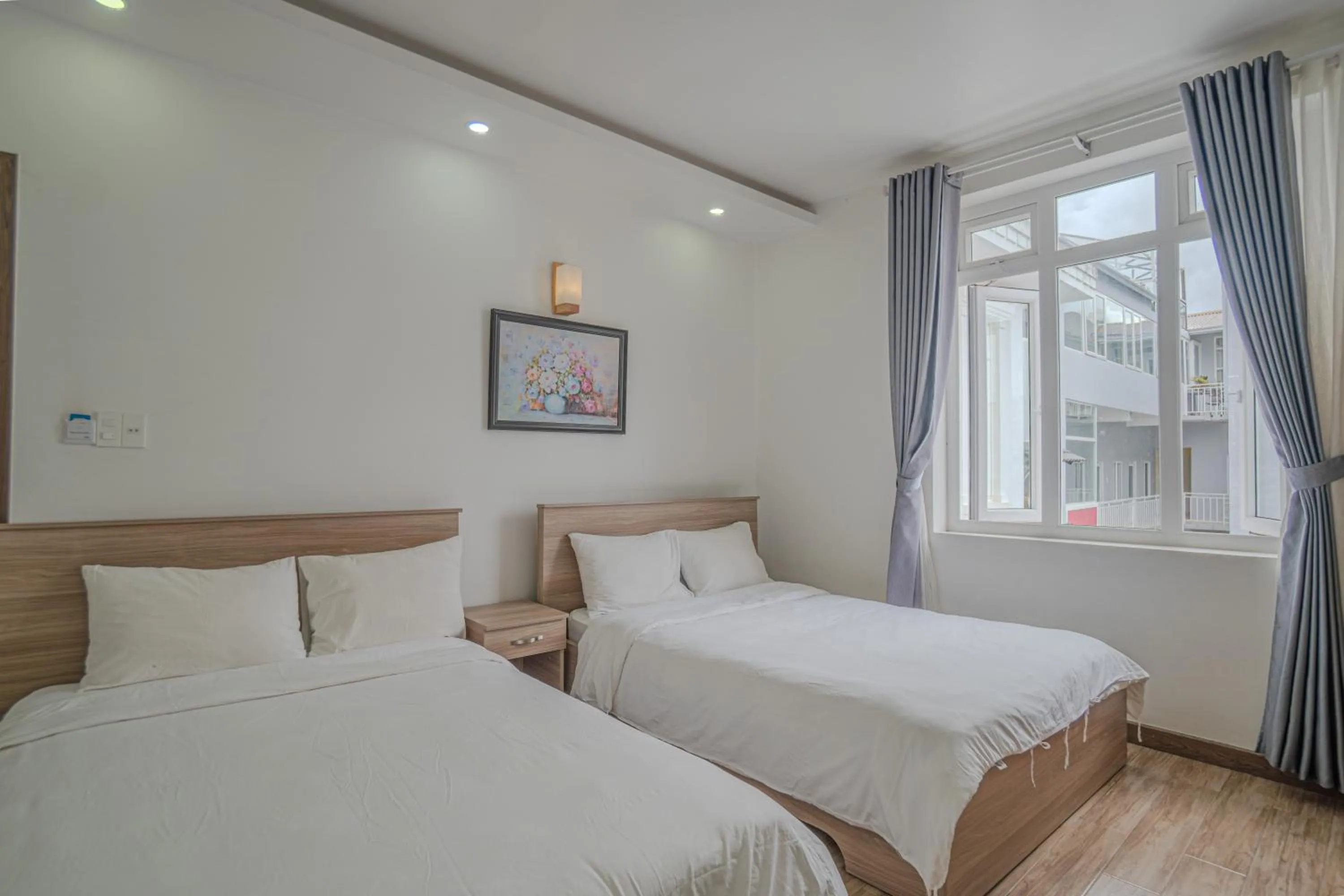 Bed in Belle Amour Hotel