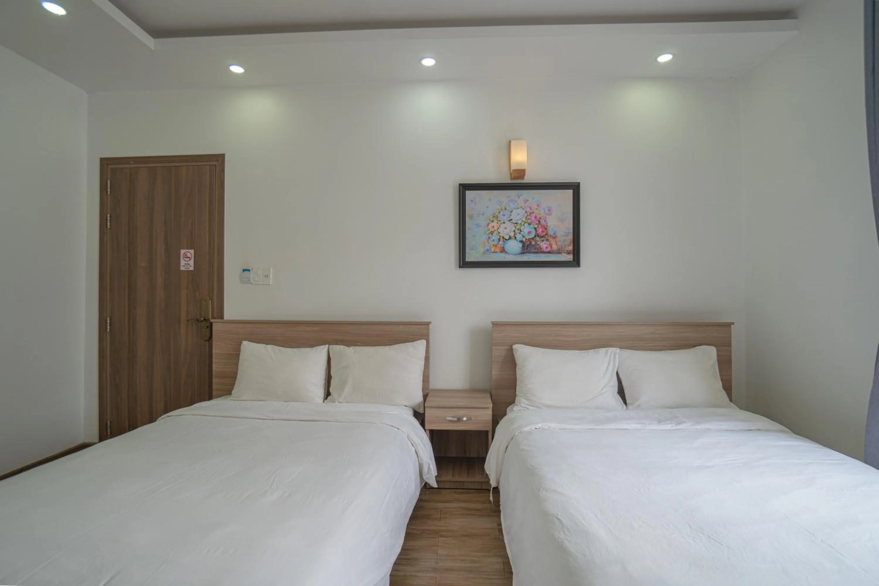 Bed in Belle Amour Hotel