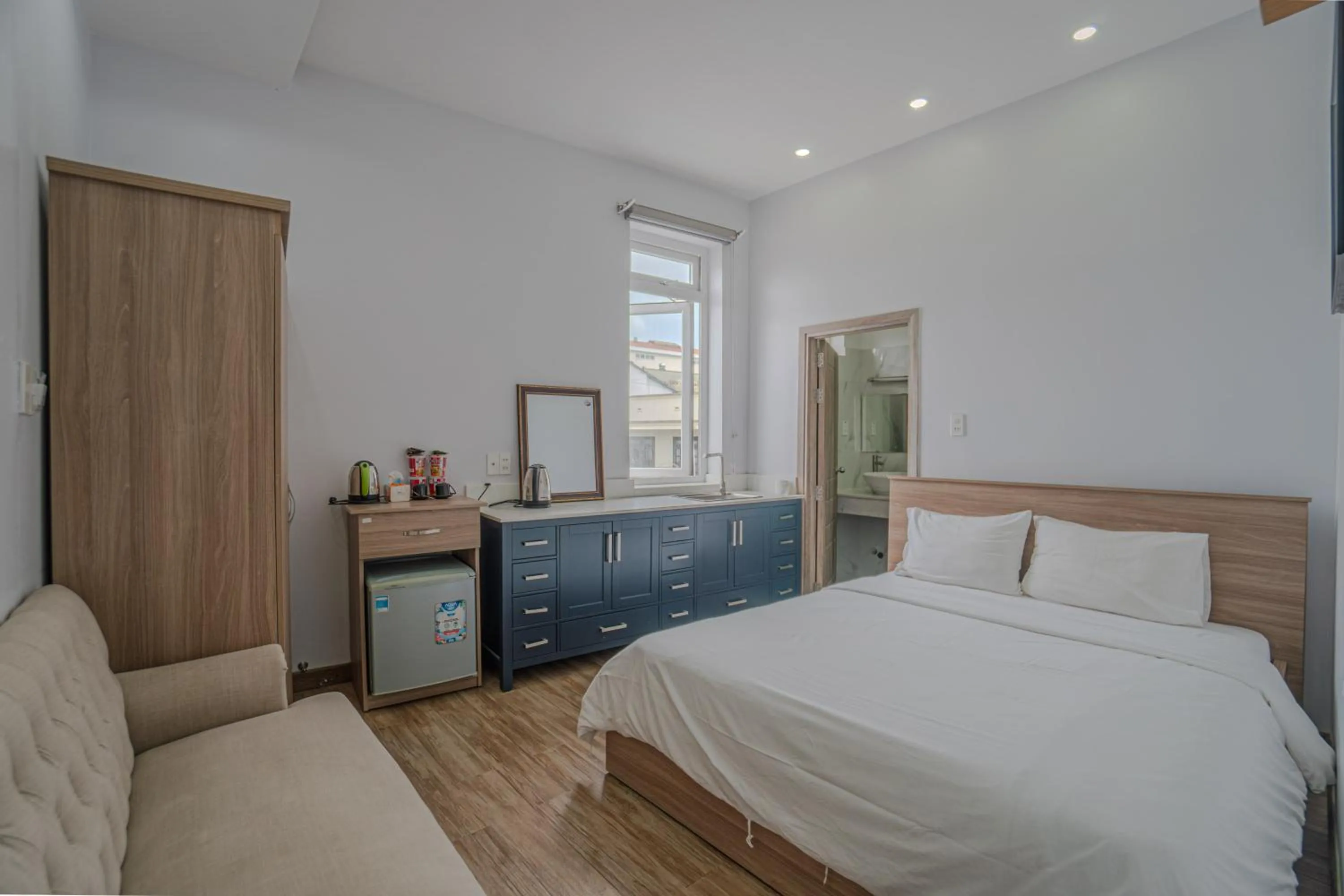 Bed in Belle Amour Hotel