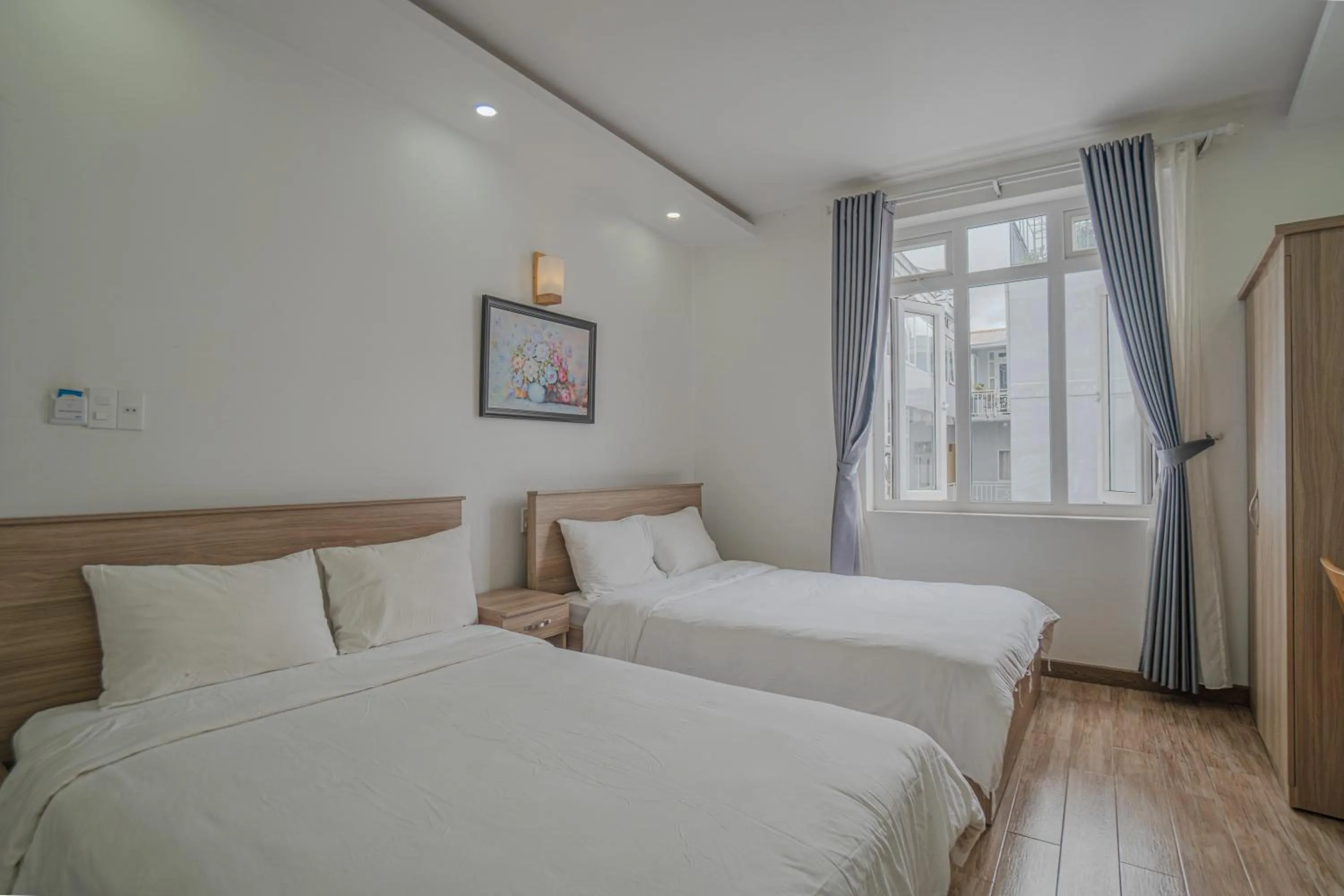 Bed in Belle Amour Hotel