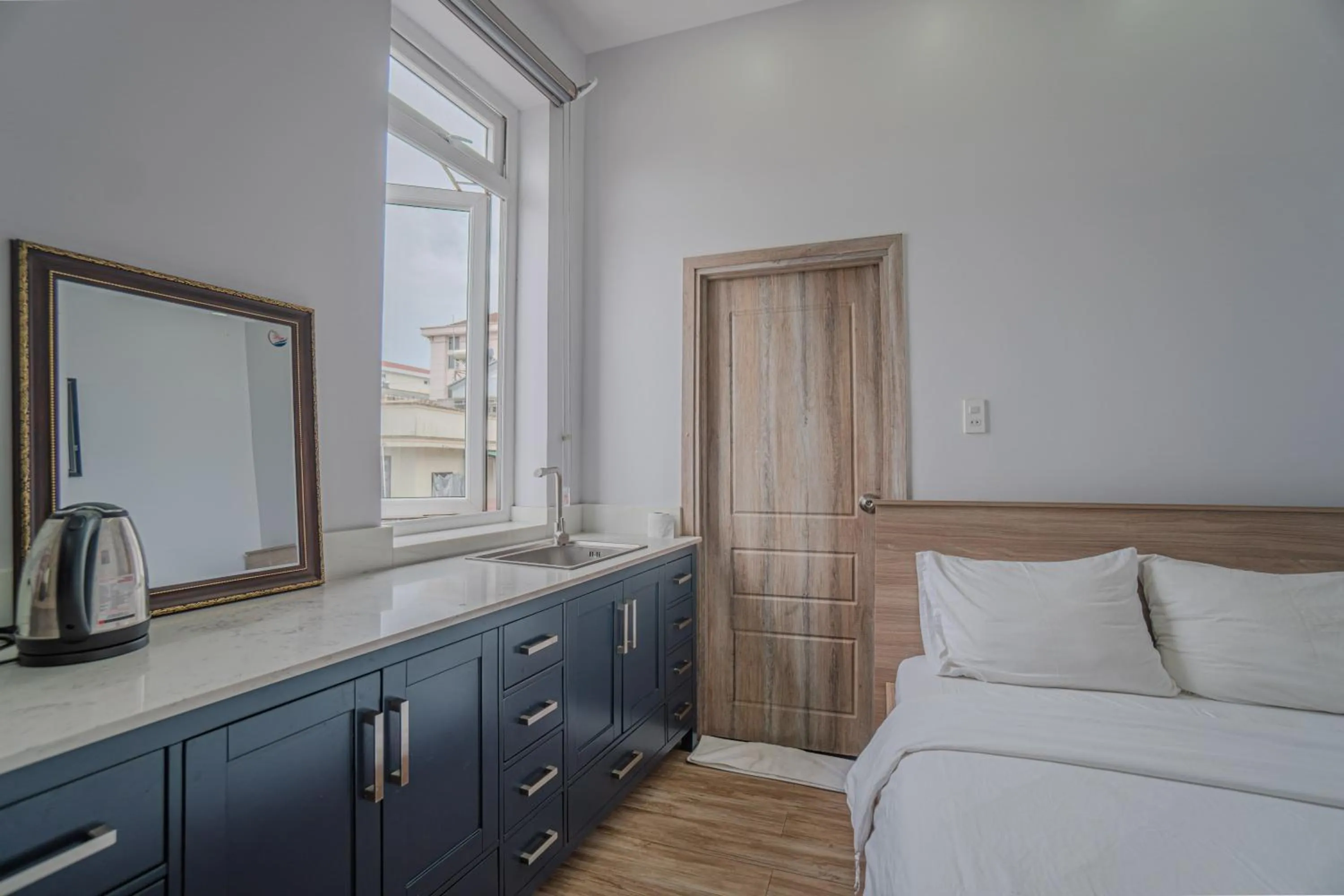 Bed in Belle Amour Hotel