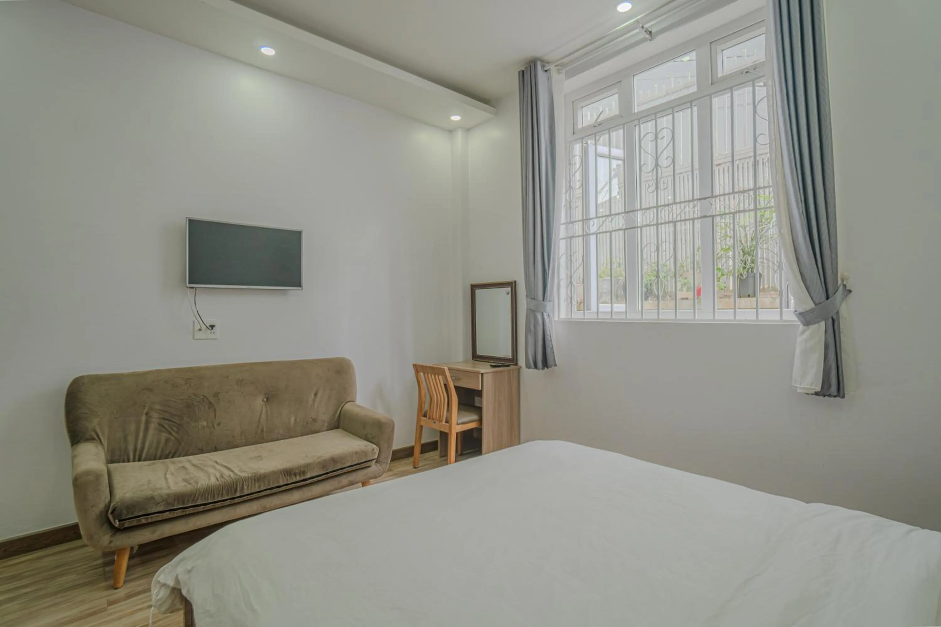 Bed in Belle Amour Hotel