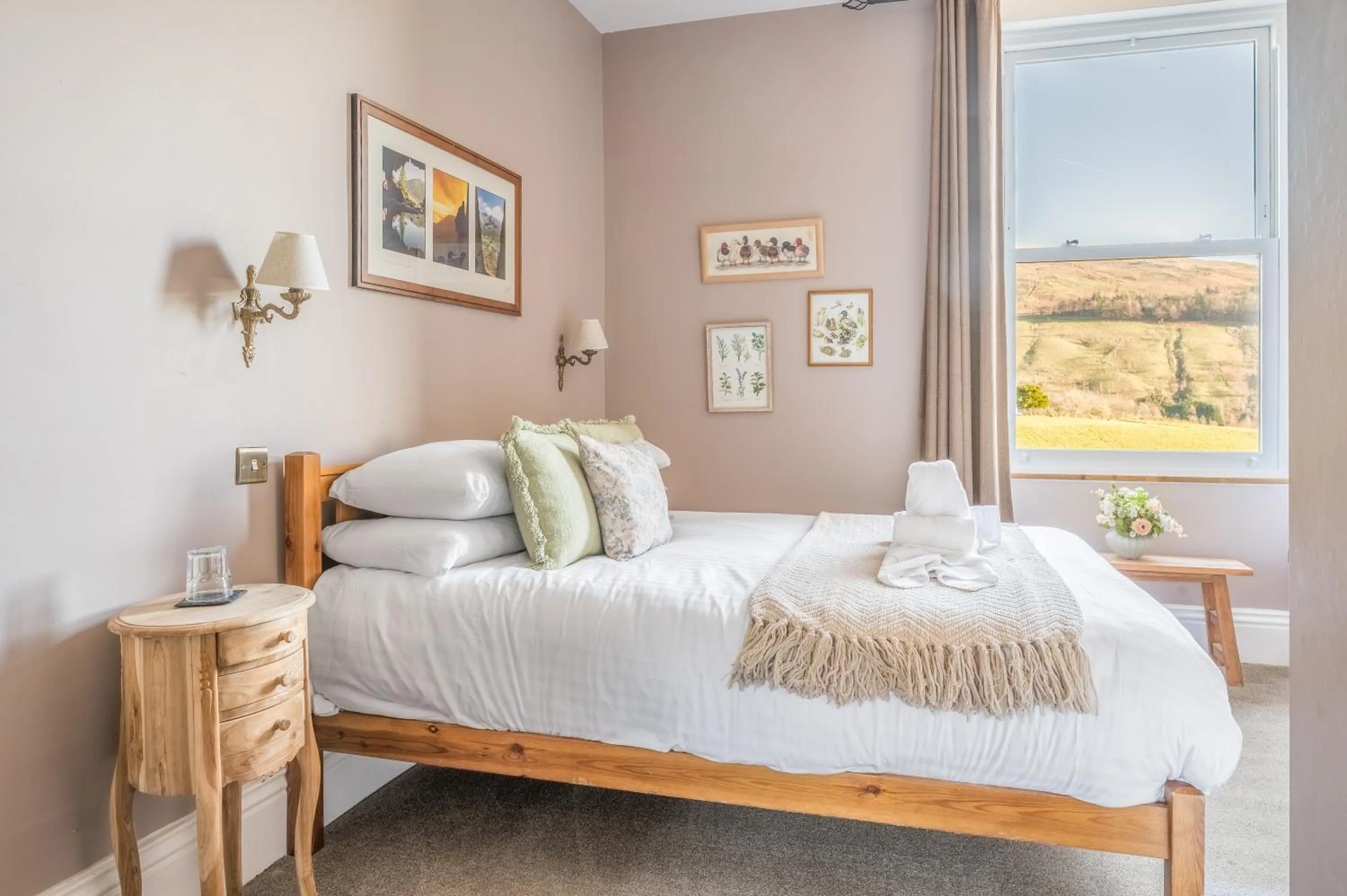 Bed in The Mortal Man Inn