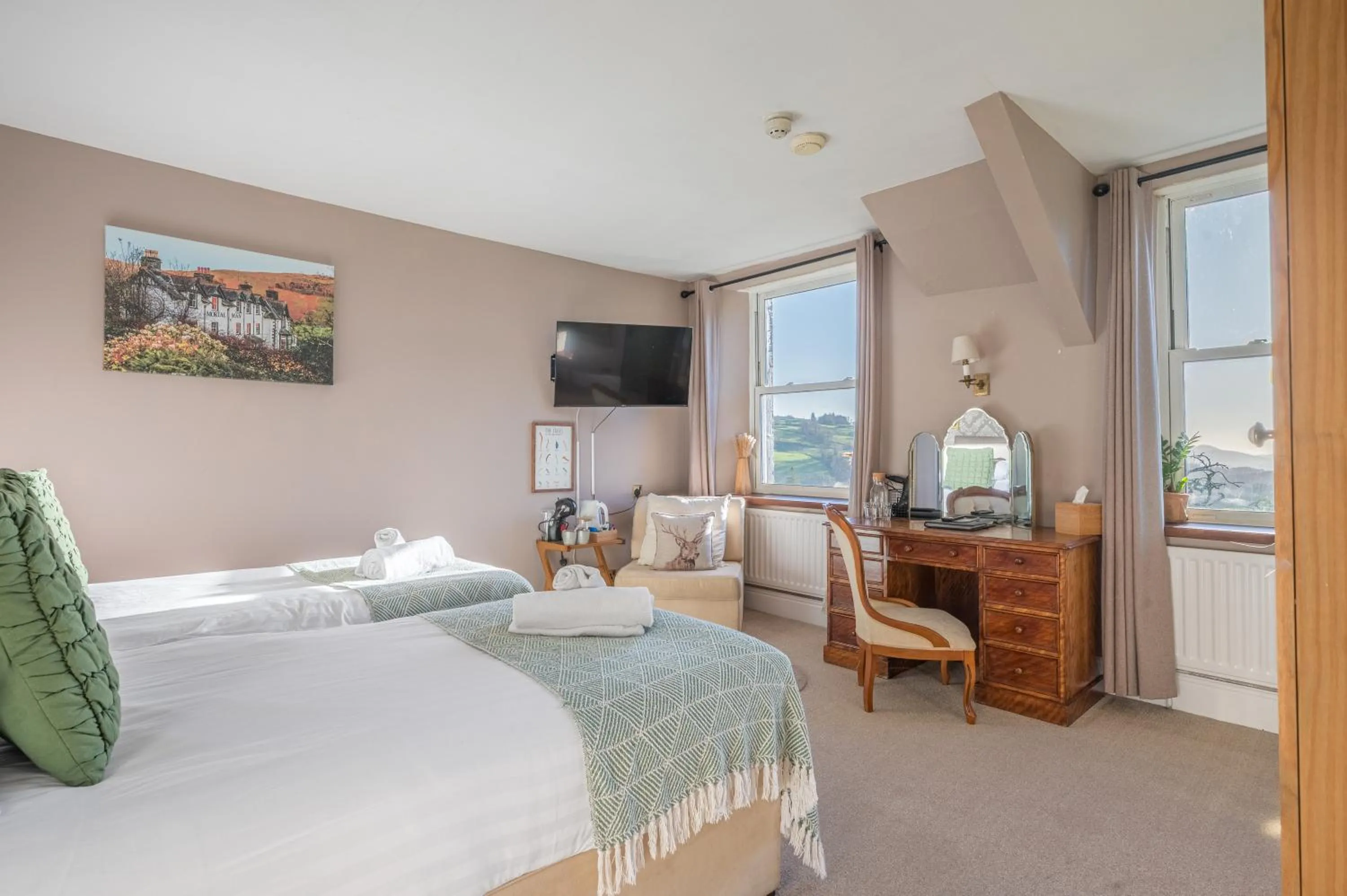 Bed in The Mortal Man Inn