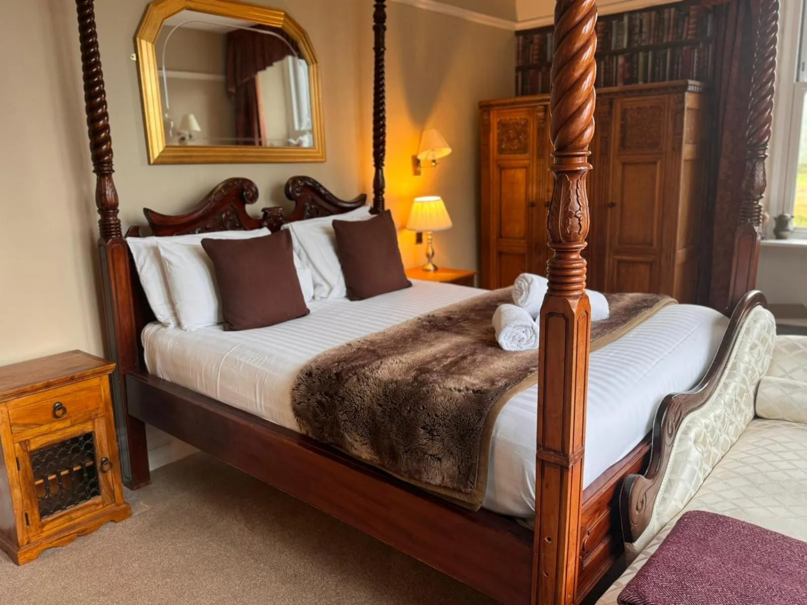 Bed in The Mortal Man Inn