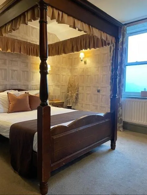 Bed in The Mortal Man Inn