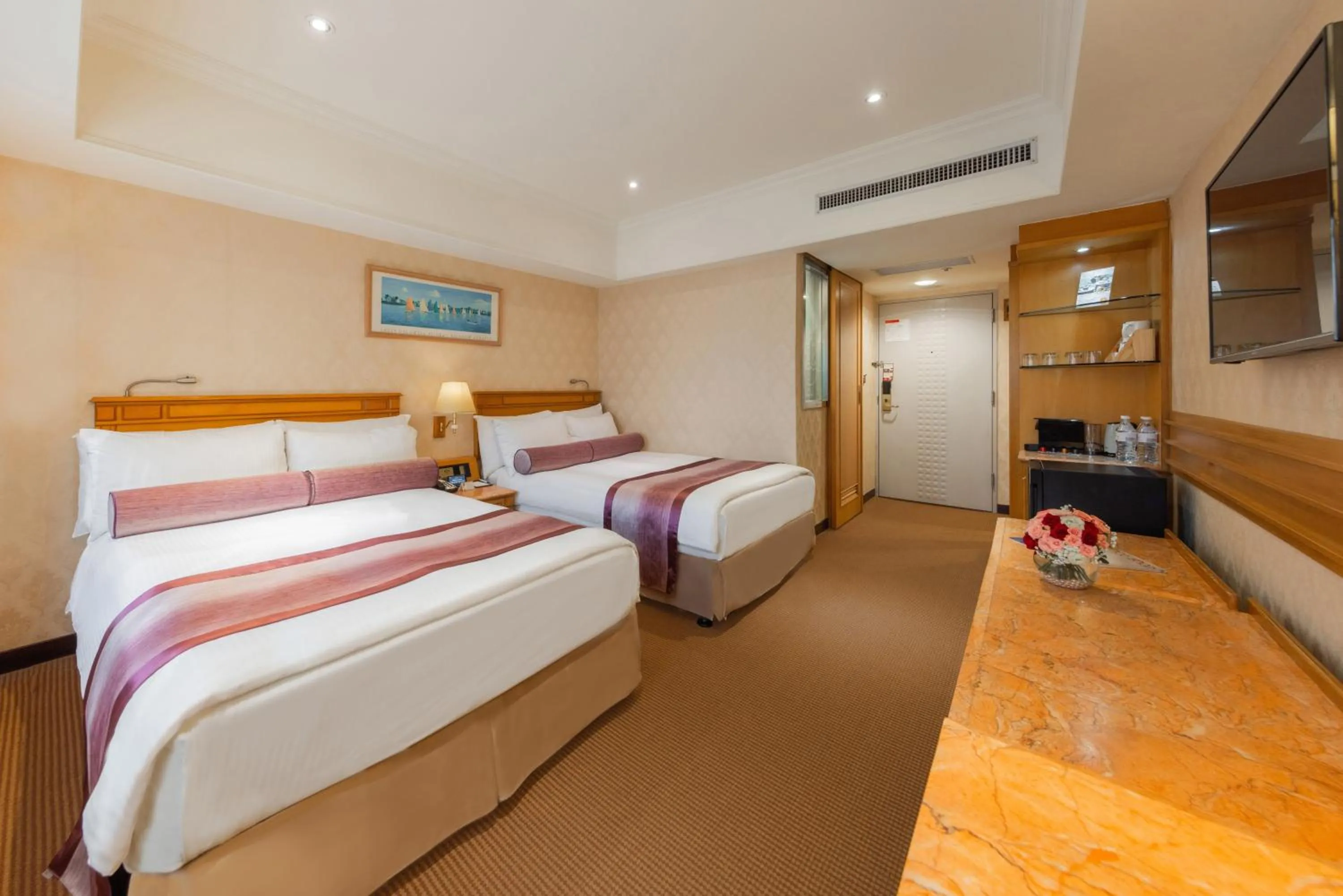 Photo of the whole room, Bed in Cosmos Hotel Taipei