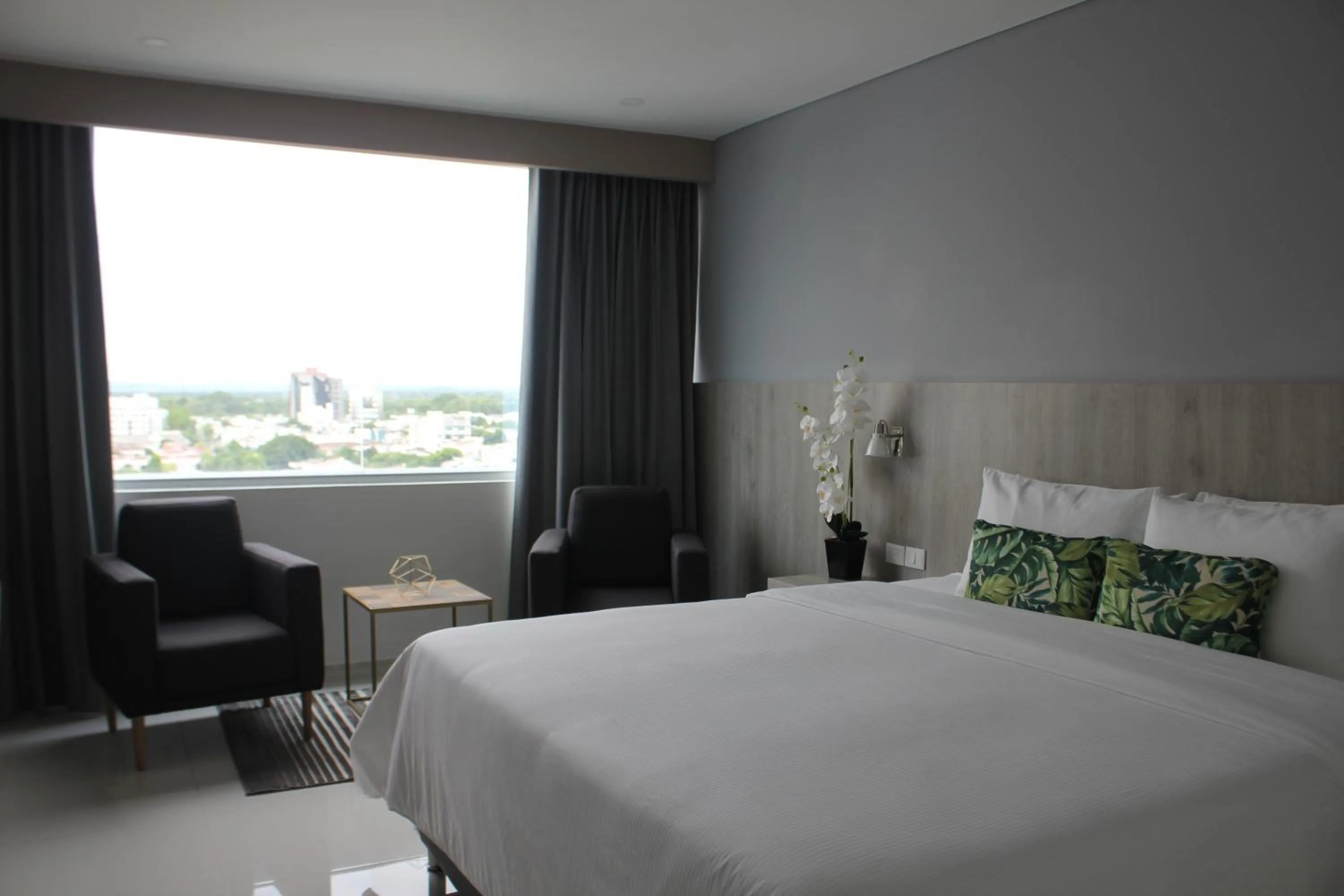 Bed in Hotel Sexta Avenida Inn