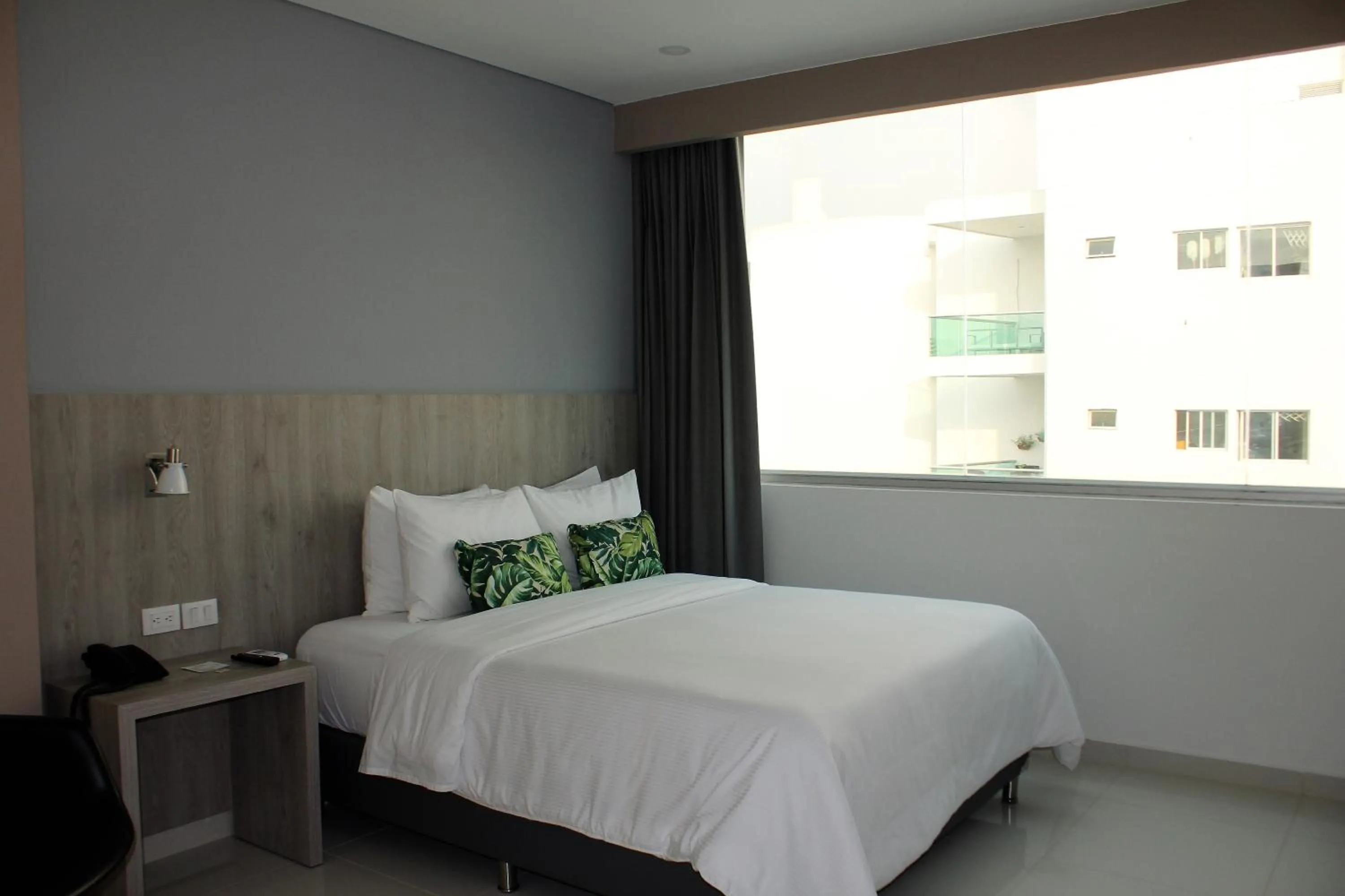 Bed in Hotel Sexta Avenida Inn